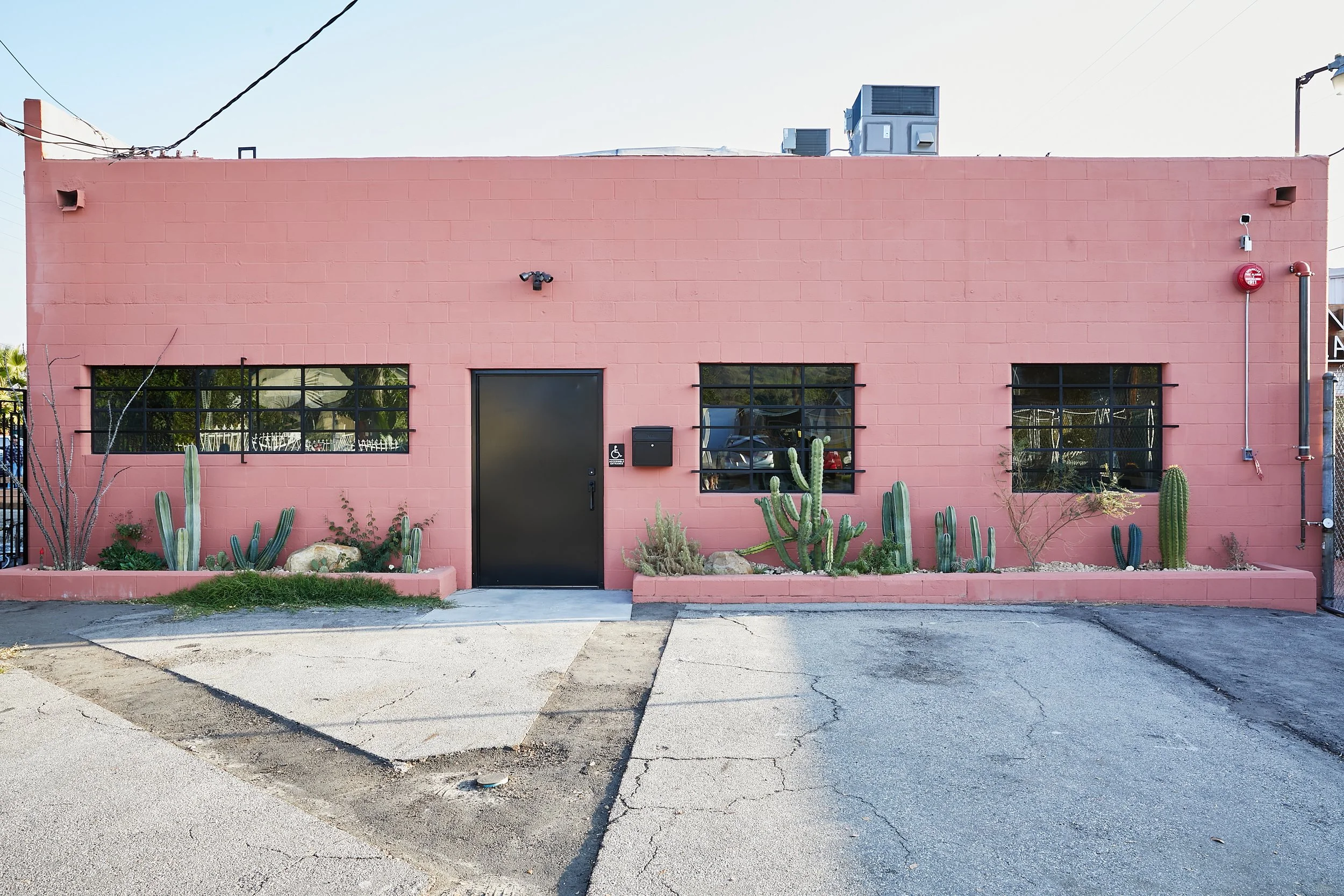 Architecture for Lazy Eye office, CMU renovation in Frogtown, pink facade