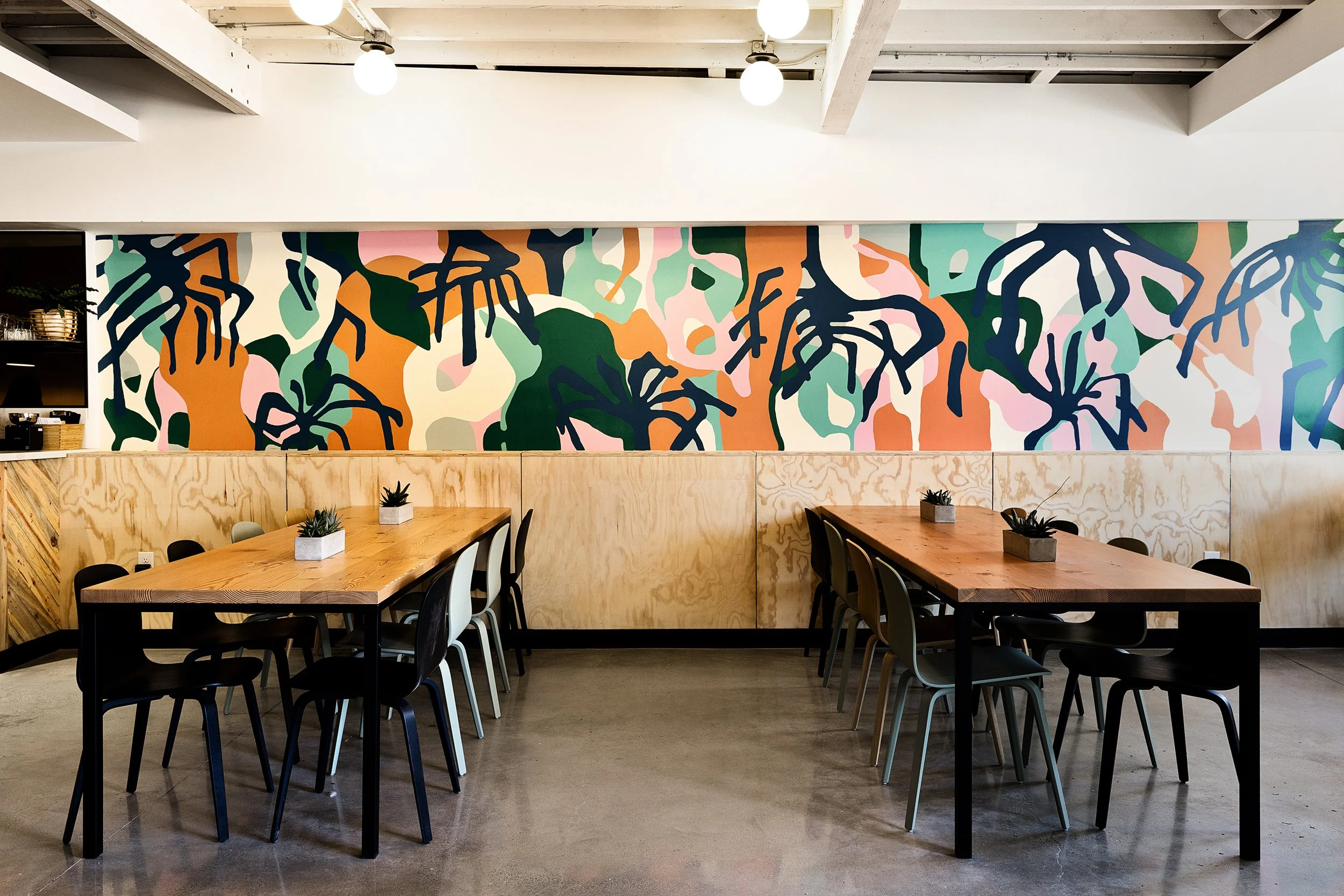 Architecture of Seabirds Kitchen restaurant in Los Feliz, seating and wall mural art