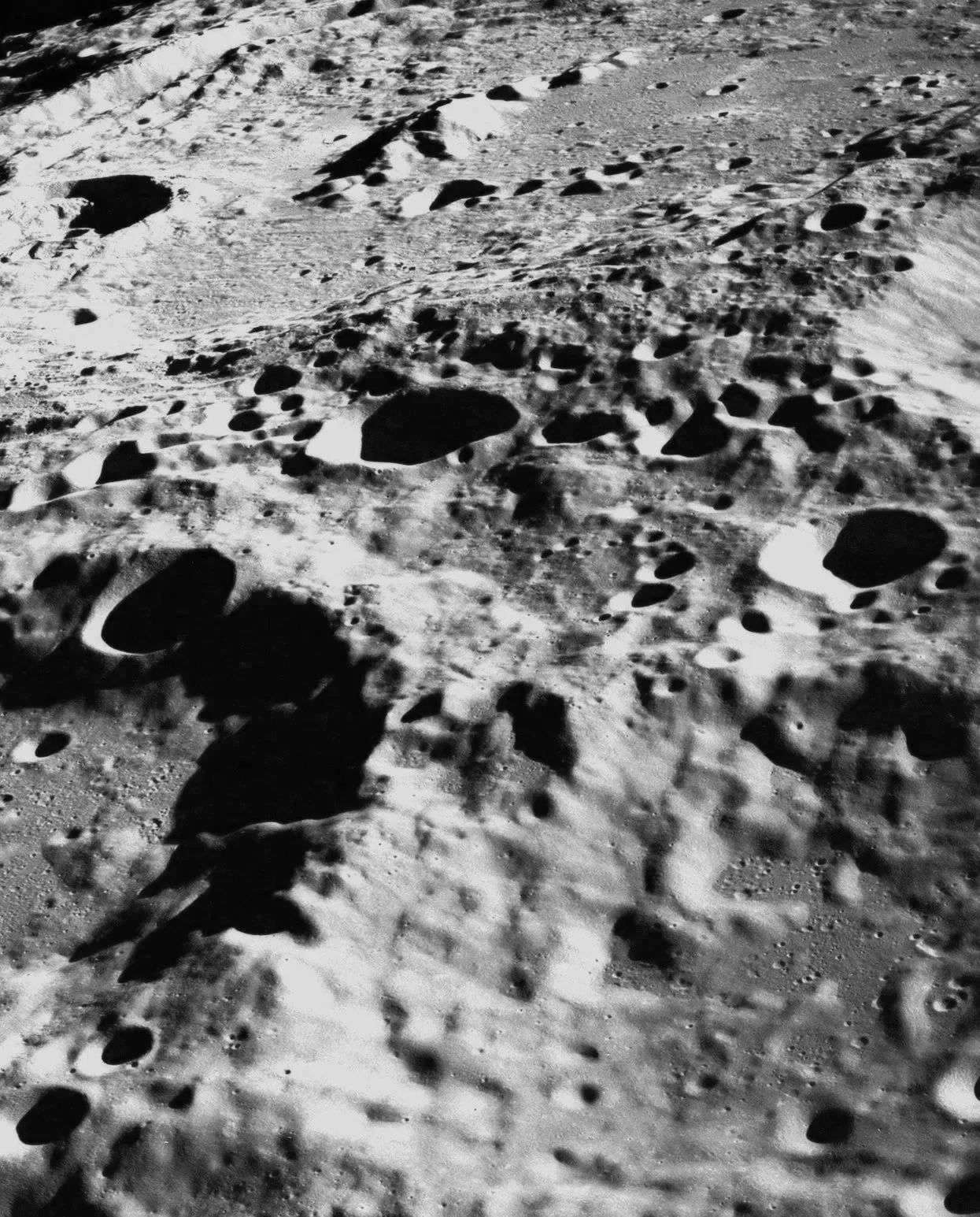 A greyscale image of a moon crater texture