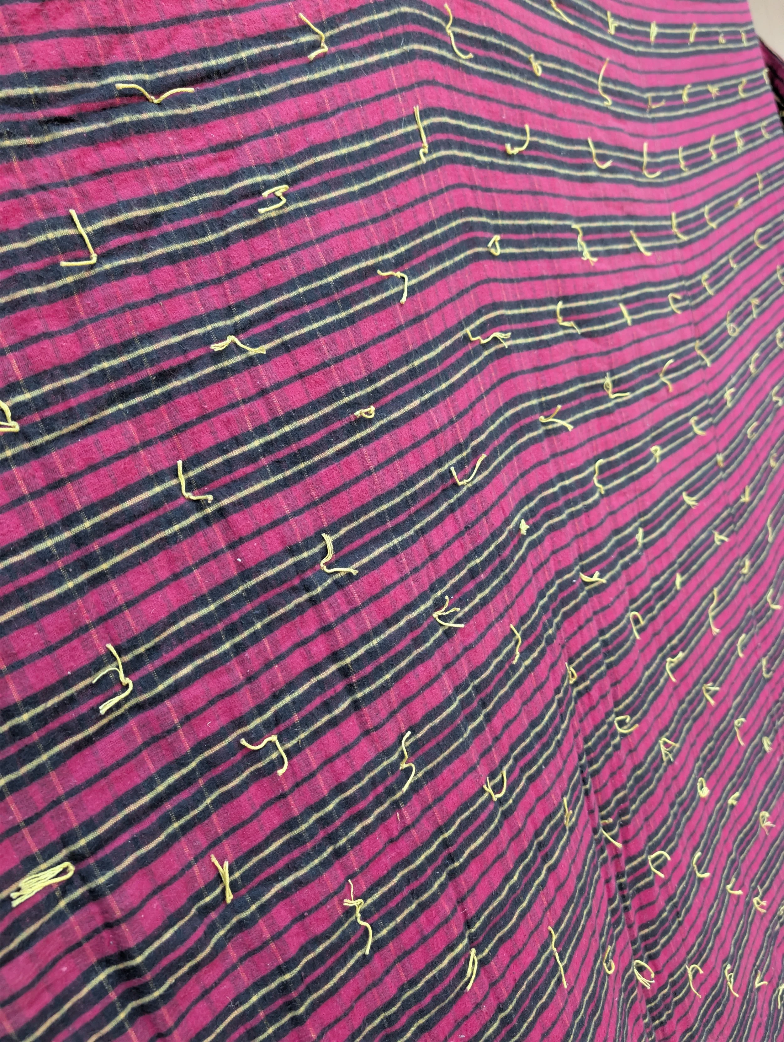 Vintage (1980s) Striped Magenta Blanket With Yellow Tie-Offs.