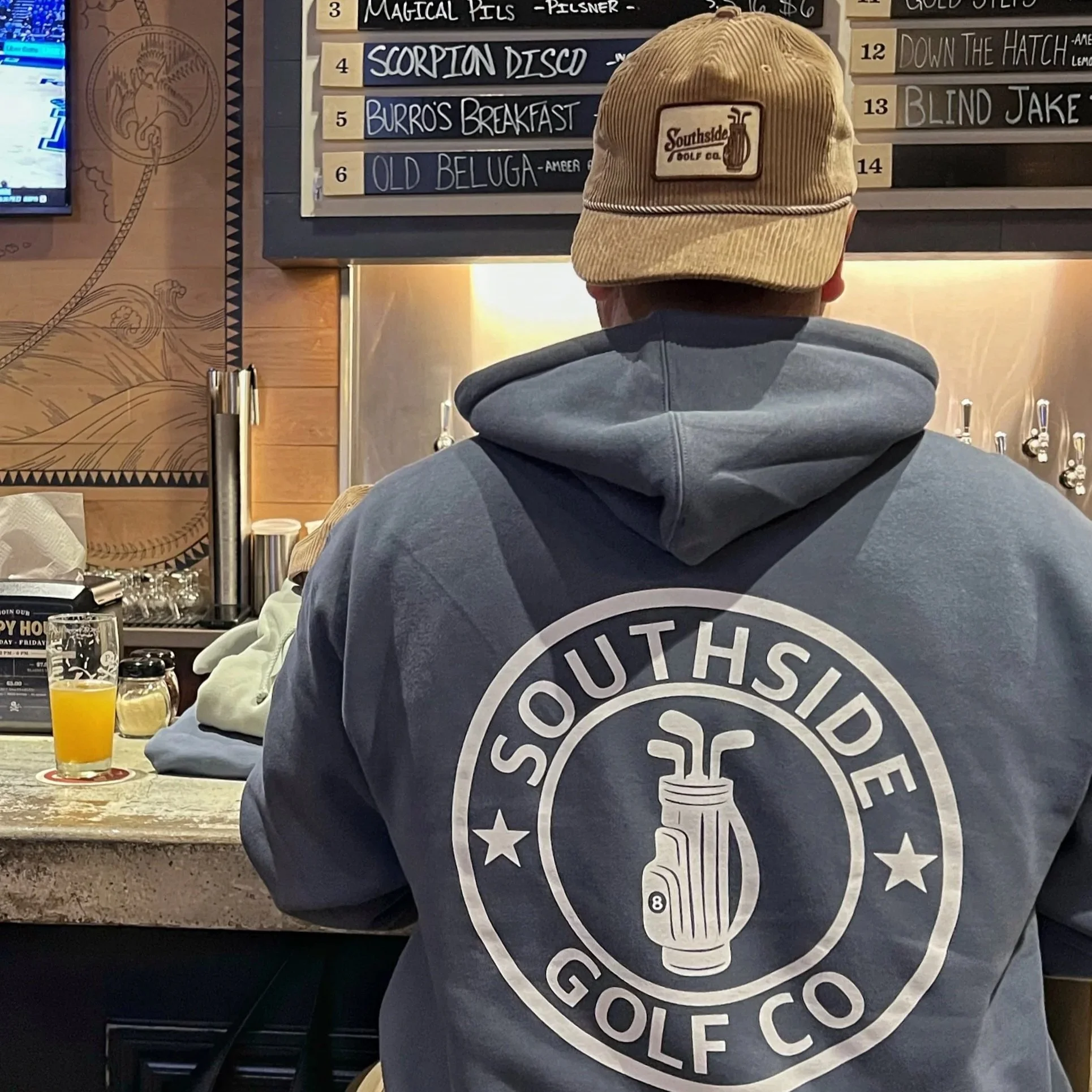 southside golf co corduroy golf hat and hoodie at austin bar
