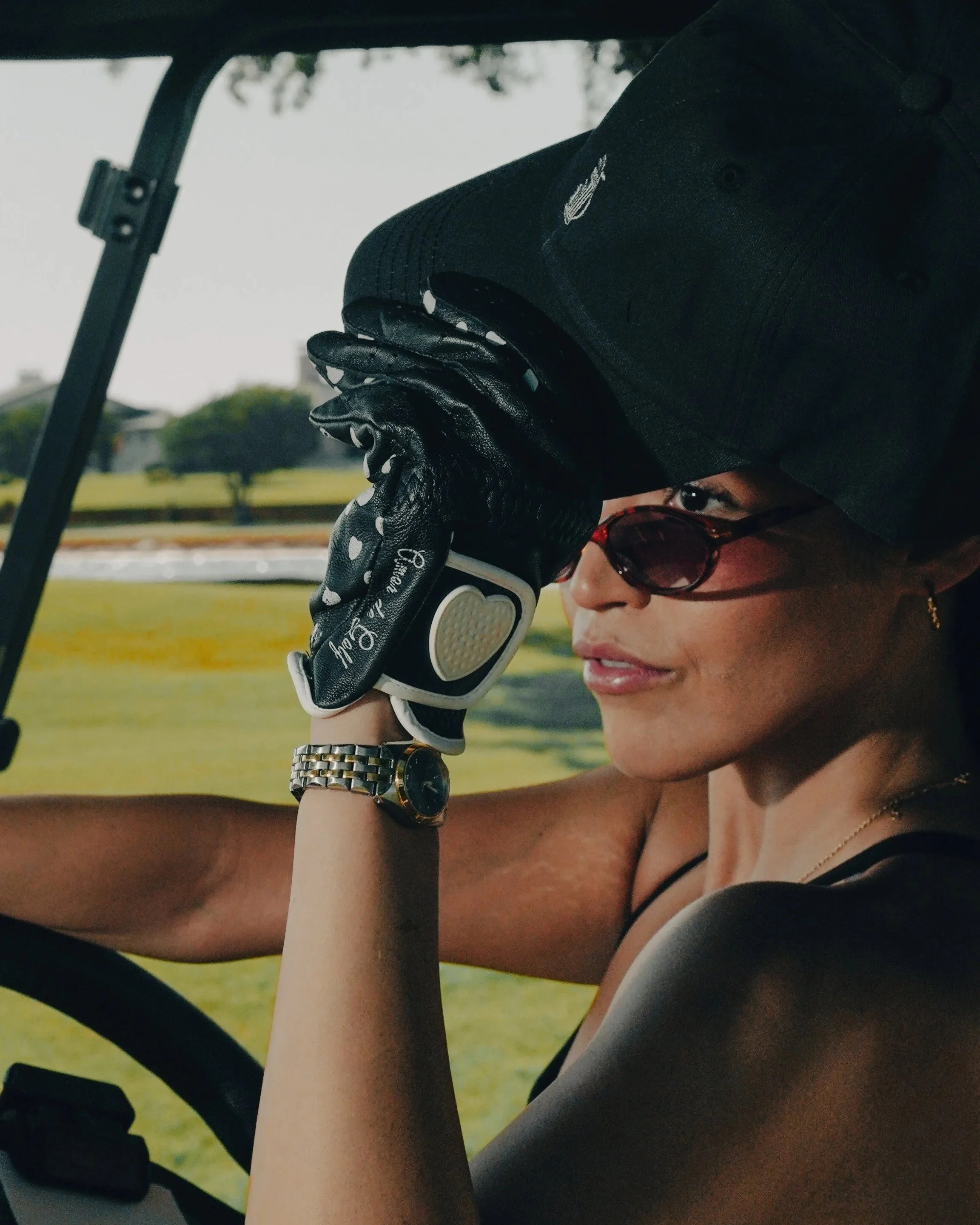 Modern golf apparel and Southside Golf Co dad hat styled on the golf course in Austin, Texas
