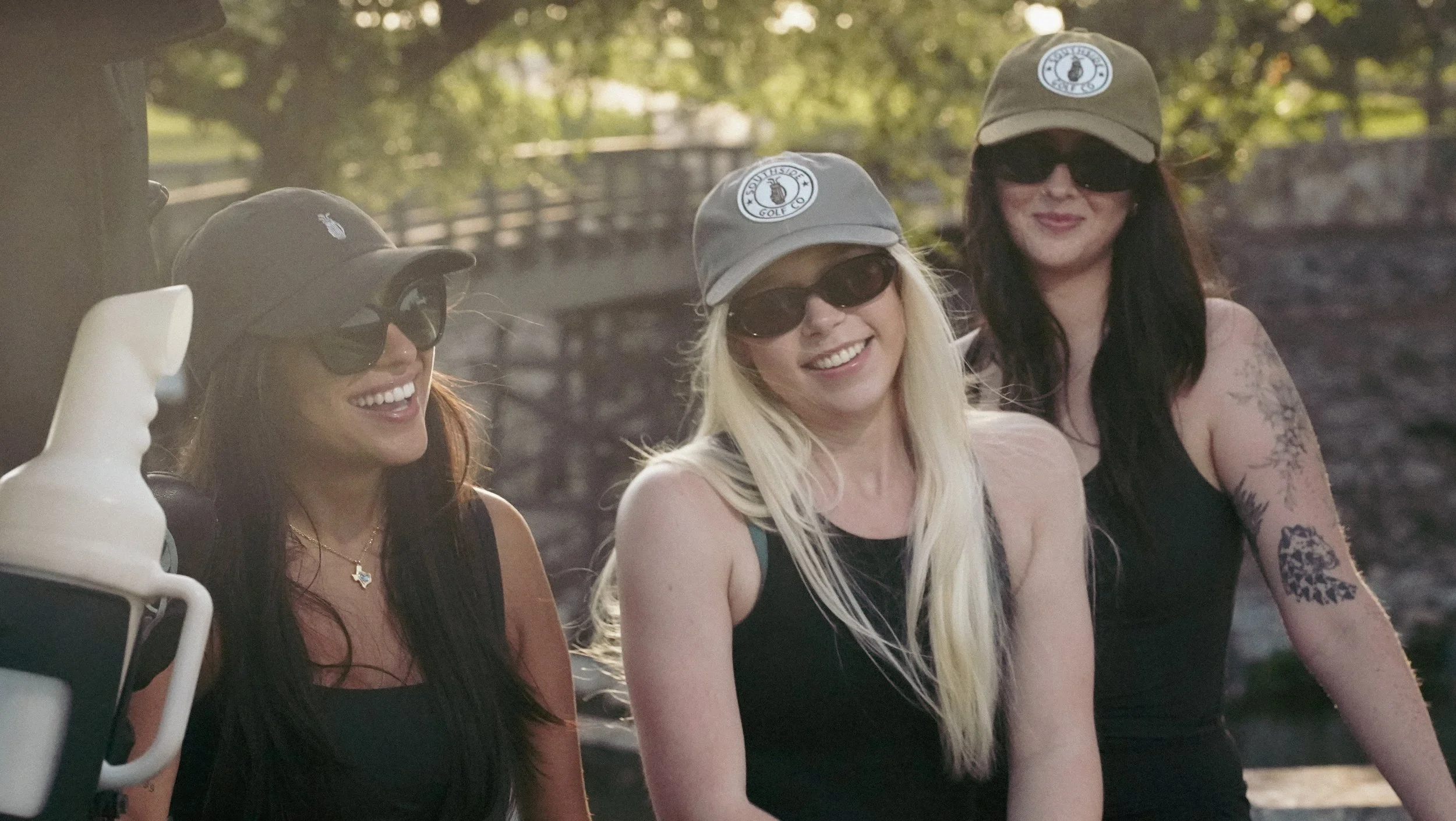 Golfers wearing Southside Golf Co hats and modern golf apparel in Austin, Texas