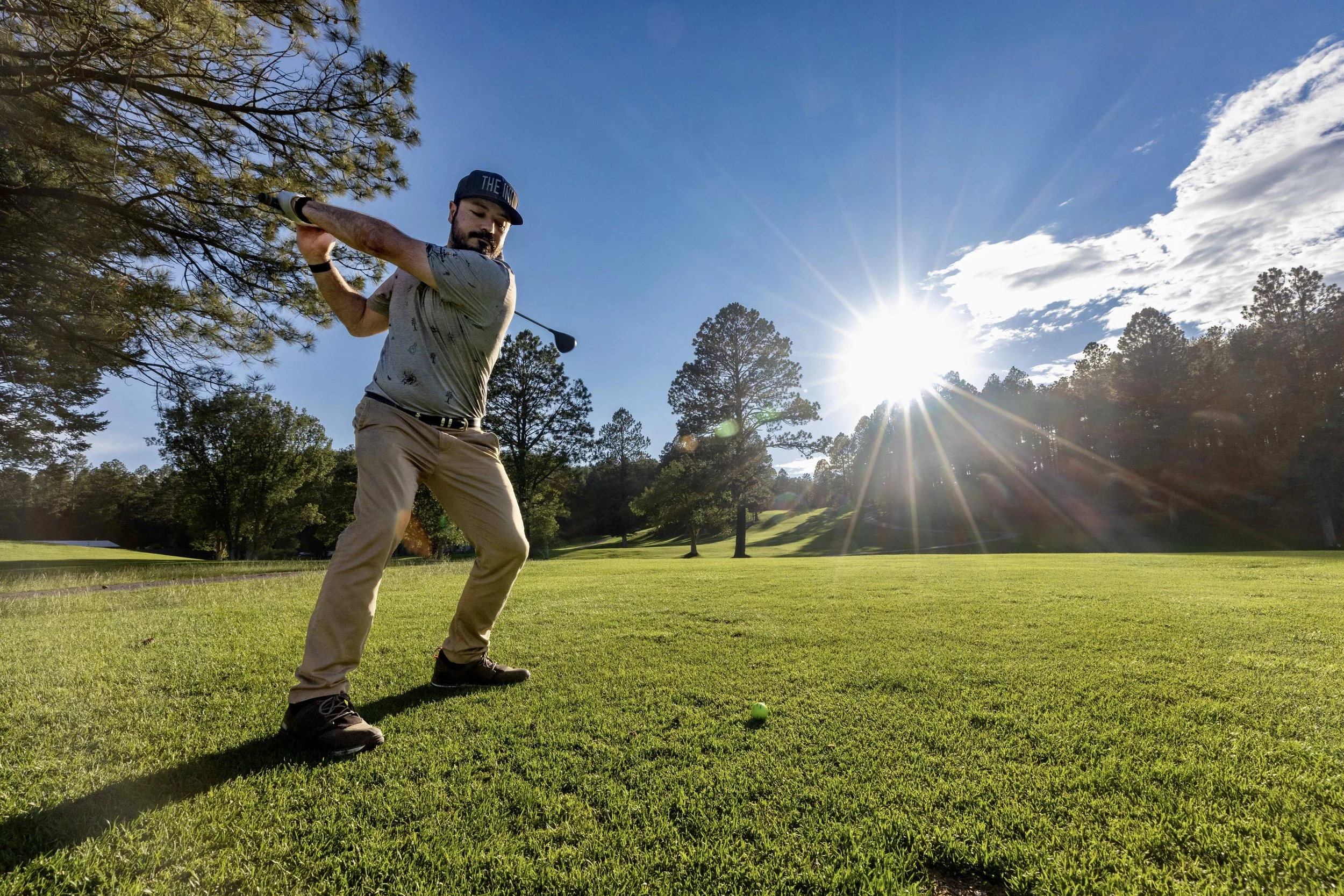 High school golfer training during a golf lesson in South Austin