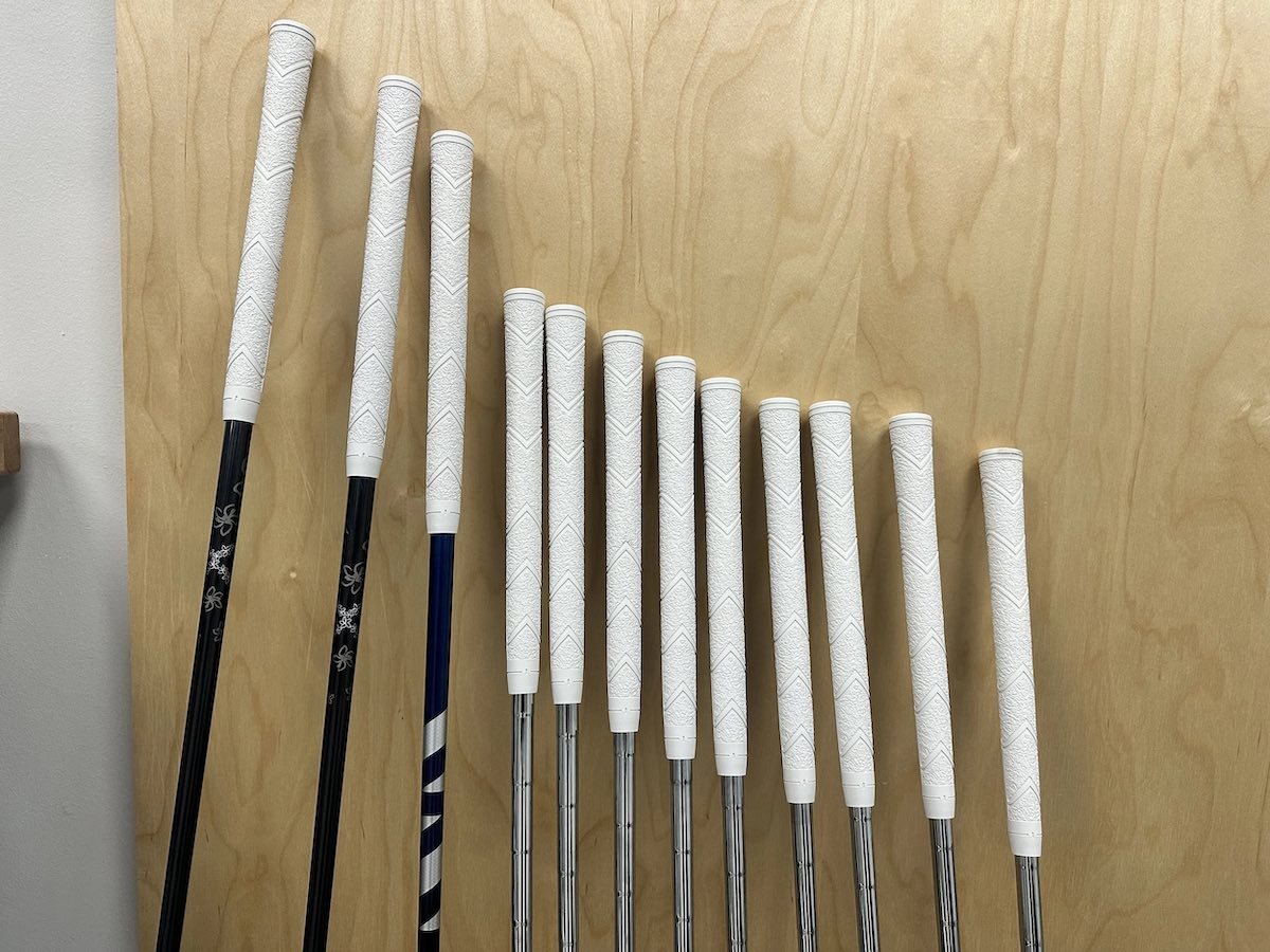 Set of golf clubs regripped in South Austin with Star STX cord grips.