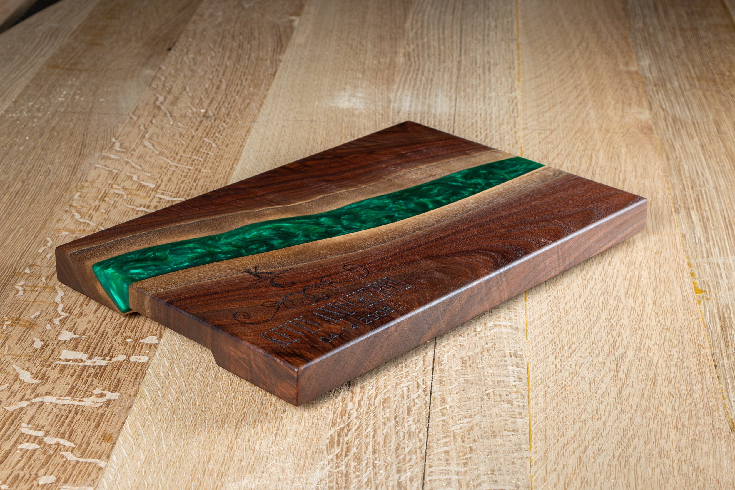 Emerald Epoxy River Walnut Serving Board. Personalized engraving for an anniversary. 