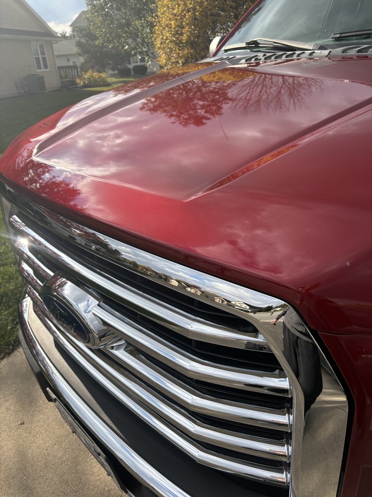 Close-up of polished automotive paint after paint correction