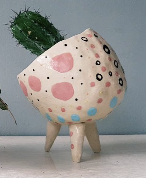 Organic clay plant pot with succulents, handmade with air-dry clay