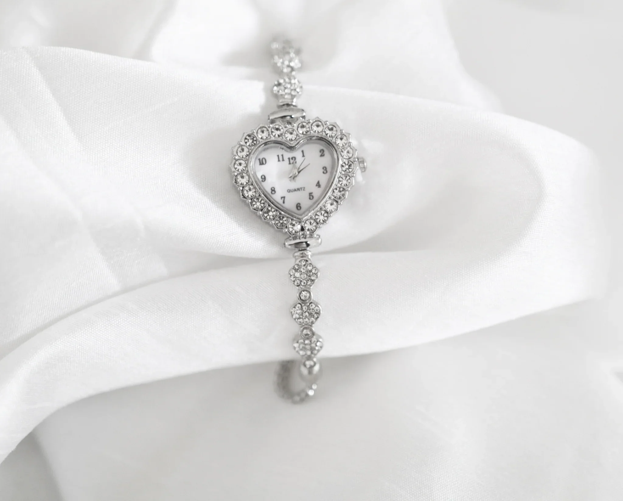 Heart shaped silver rhinestone watch with mother of pearl dial