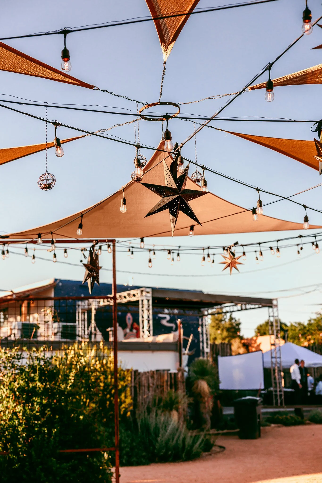 String lights and southwestern decor hanging above the courtyard at The Mystic wedding venue in Santa Fe, New Mexico.