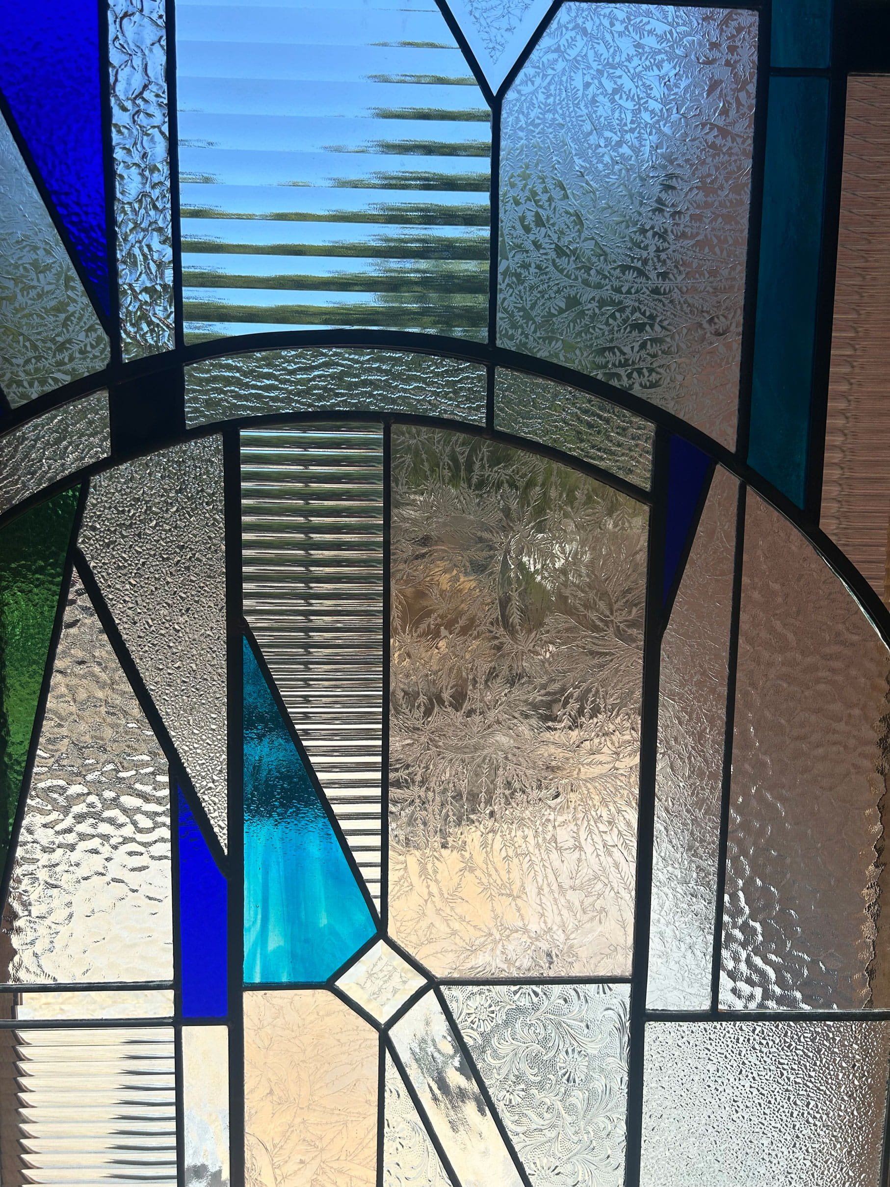 Secret Garden House photo by Sonder Architects - stained glass