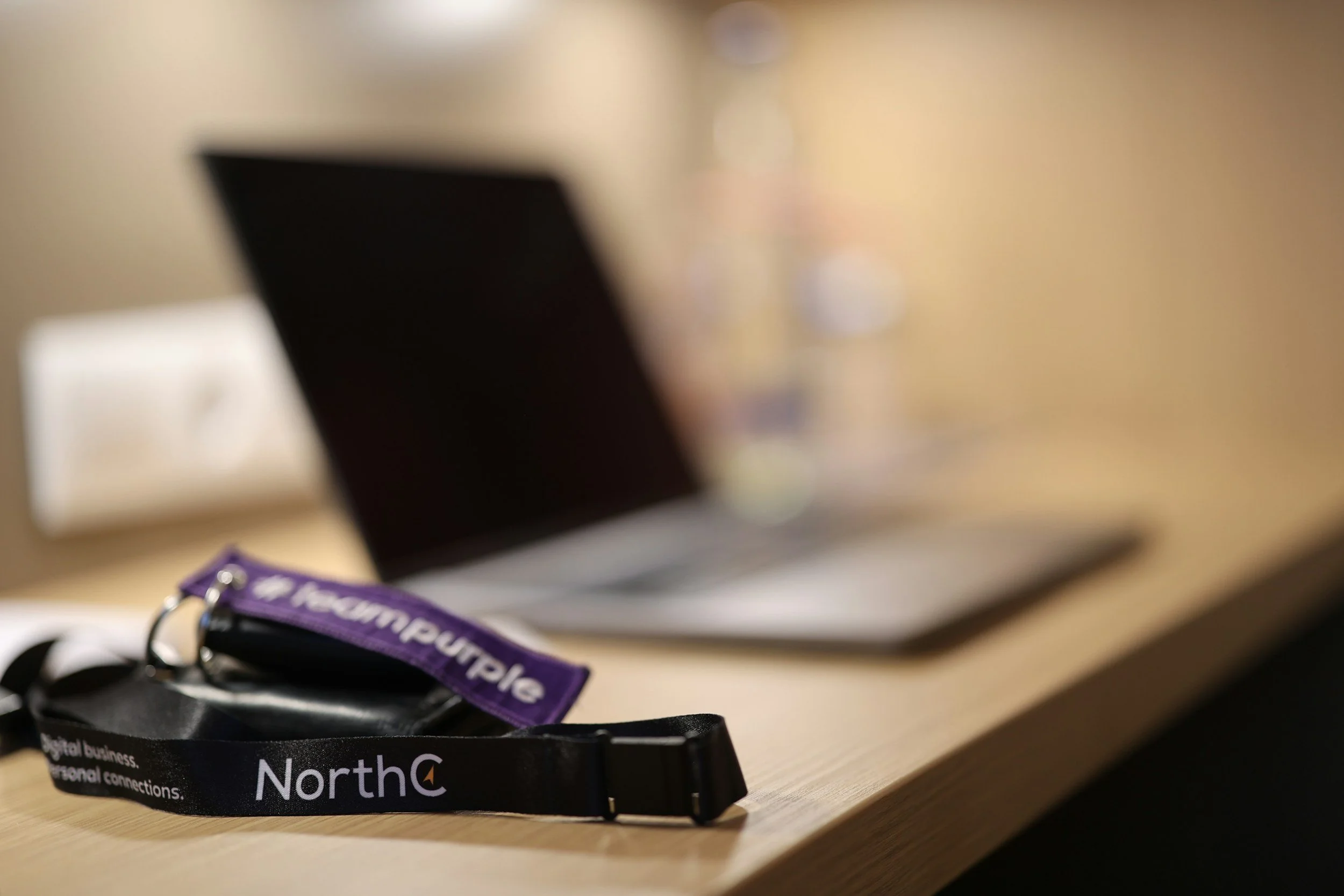 Laptop and Lanyard on Desk in a Hotel