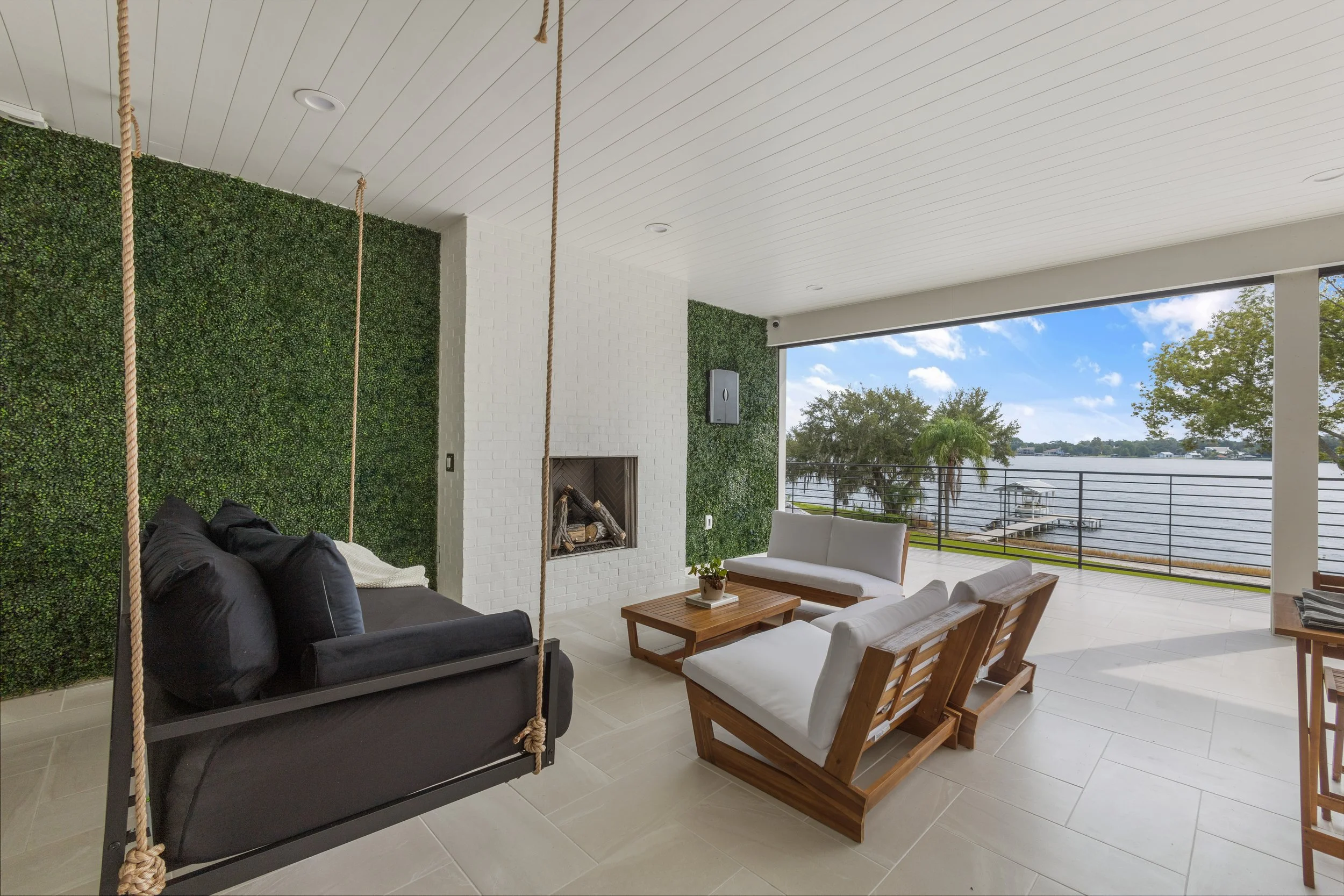 Modern patio with bed swing