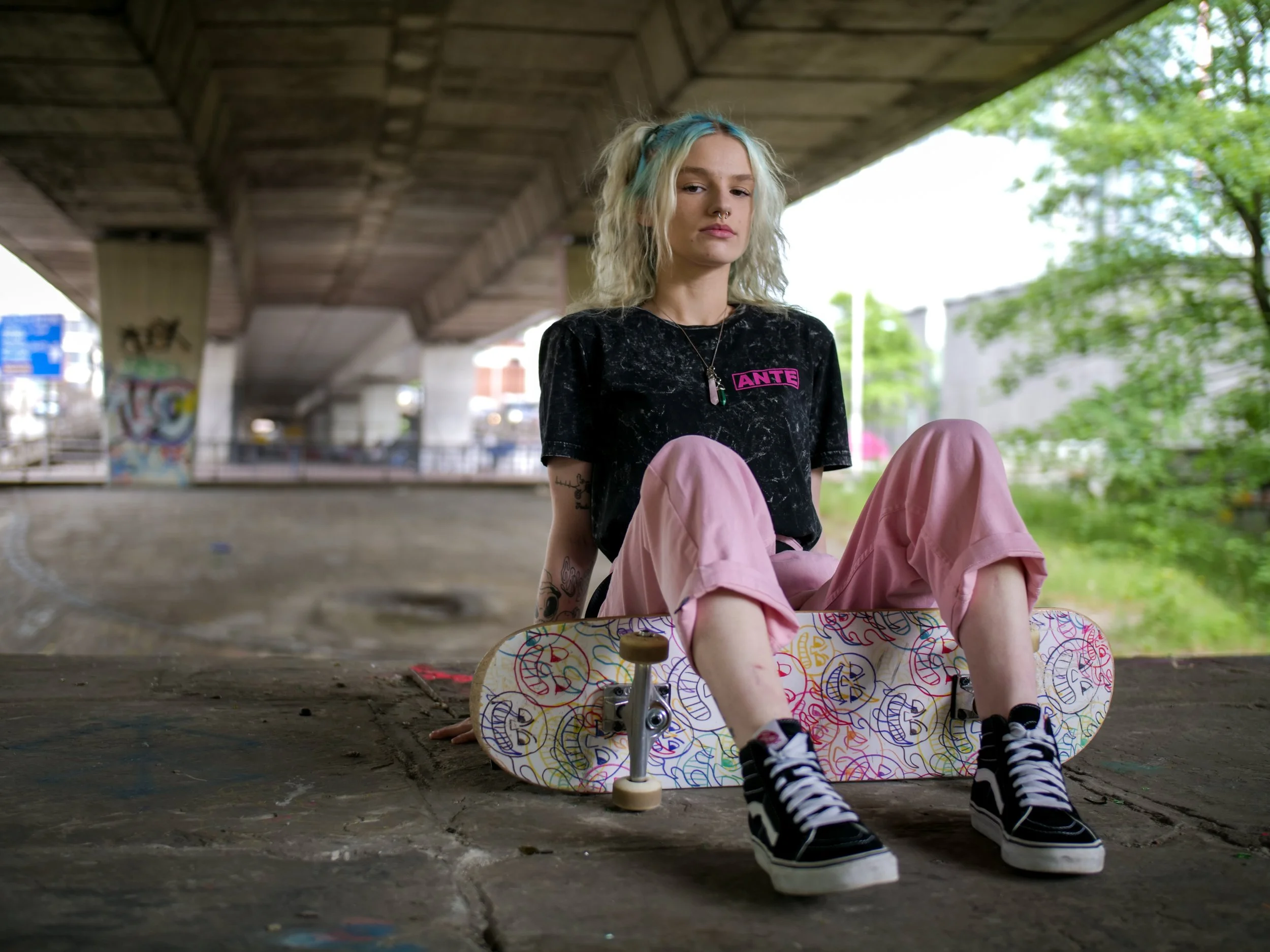 Lifestyle portrait photography featuring alternative fashion and skate culture aesthetics.