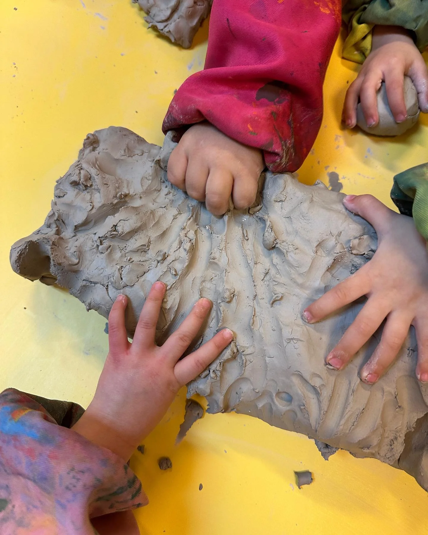 We love clay! The children were introduced to ceramic clay&mdash;different from the terracotta clay they were used to. They explored, experimented, and noticed similarities and differences in their properties while continuing to challenge their fine 