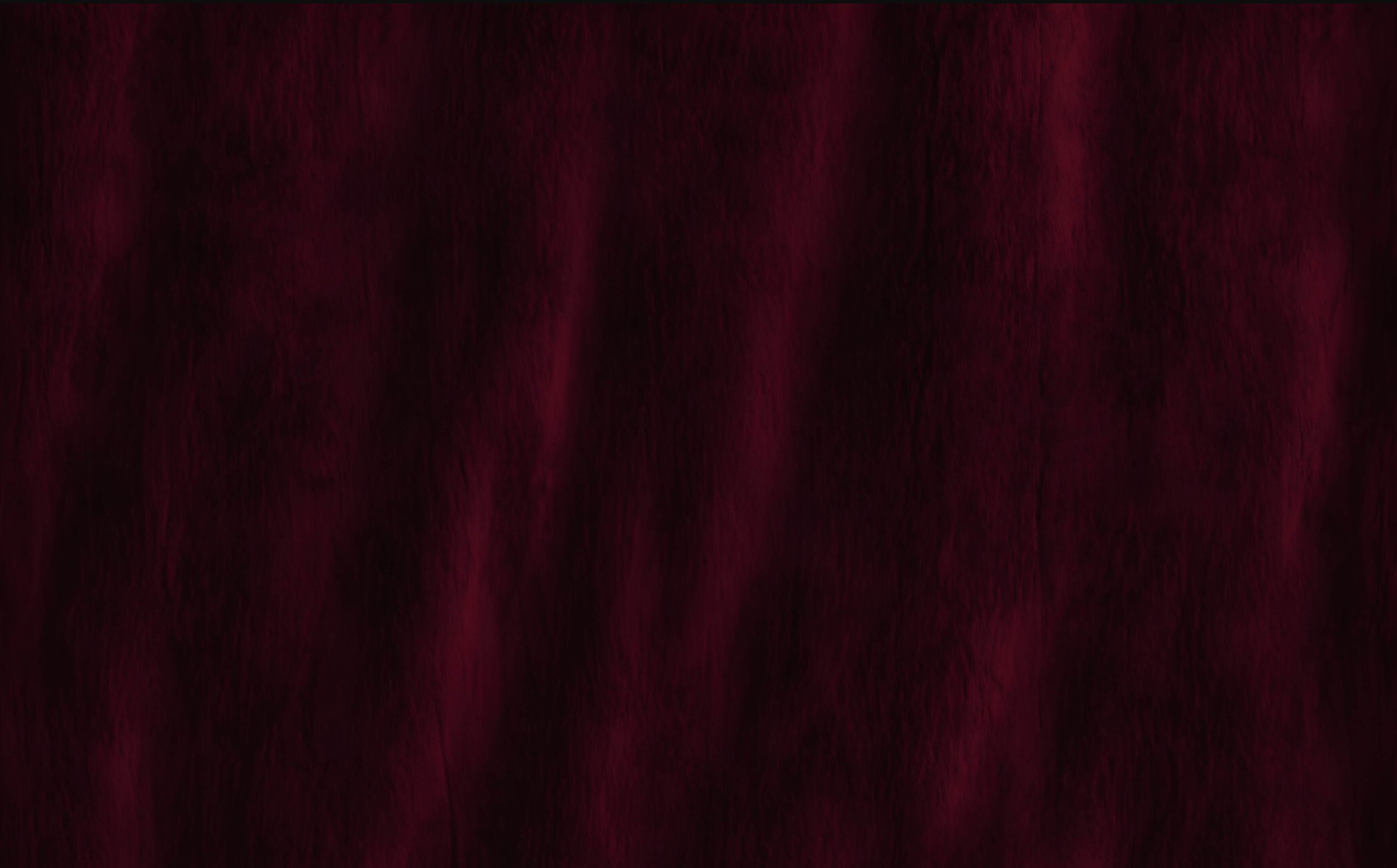 Dark red and black textured fabric or curtain with vertical folds and subtle shading variations.