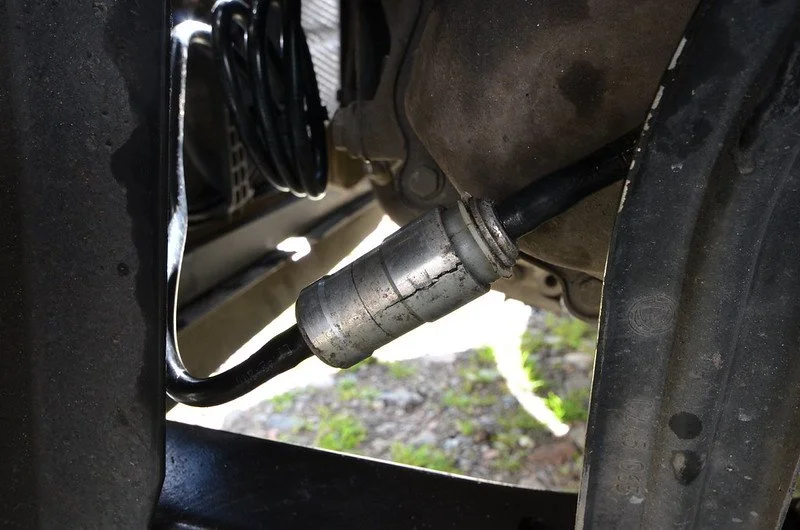 Close-up of the Fiat 500 clutch hydraulic pressure pipe joint.