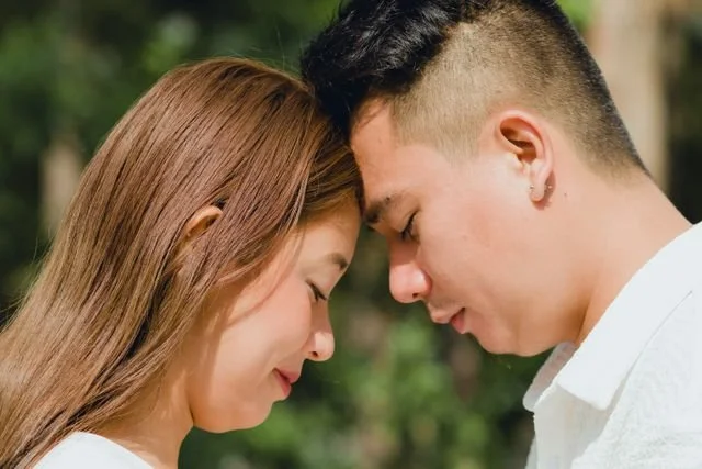 couple with foreheads touching