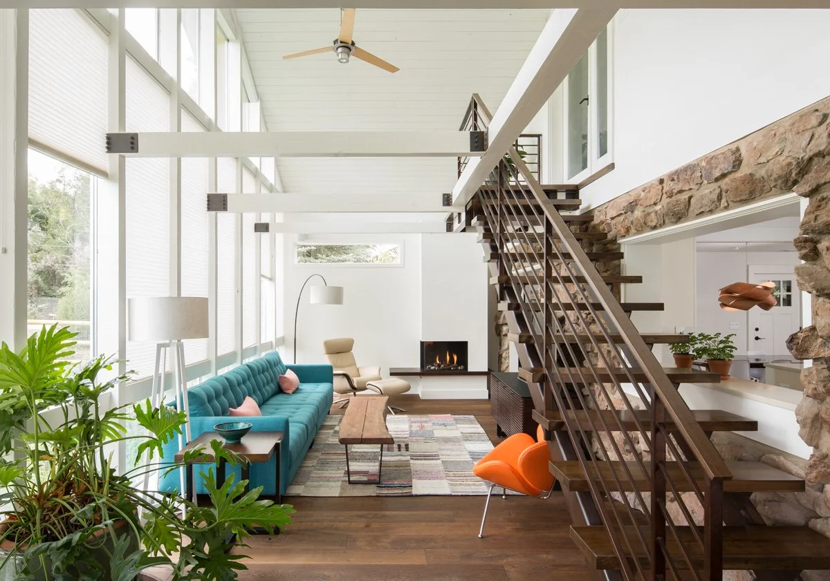 Open living room of the Anabranch House by AsOne Architecture inspired by branching river systems that connect interior spaces through light and movement.