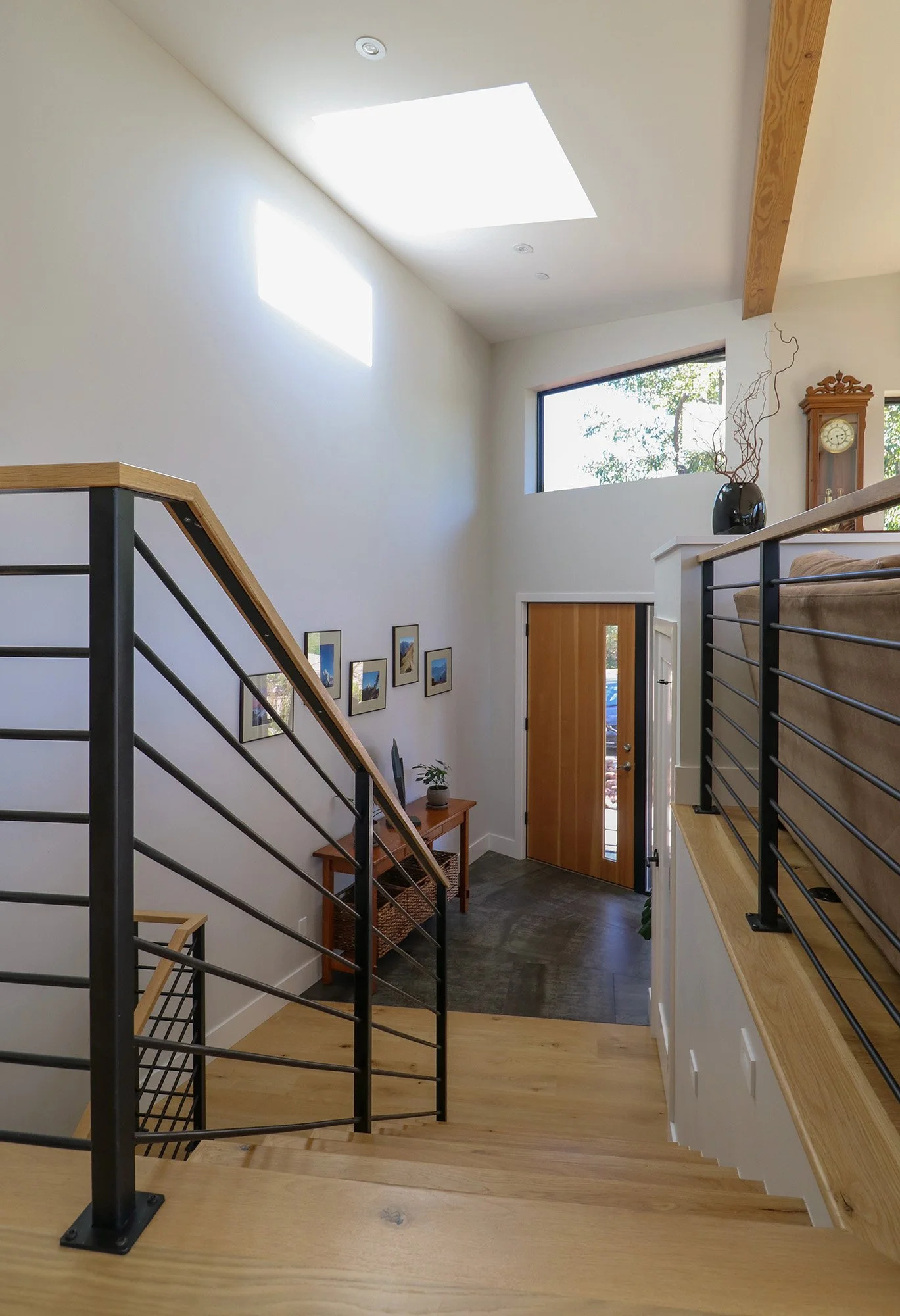 Open living space of the Folded House by AsOne Architecture, a modern custom home in Boulder where folded roof planes bring natural light deep into the interior.