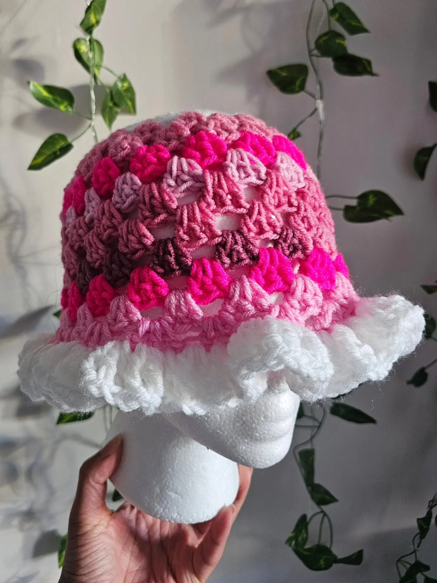 A bunch of colorful hats with flowers on top! 🌸 Which one is your favorite?