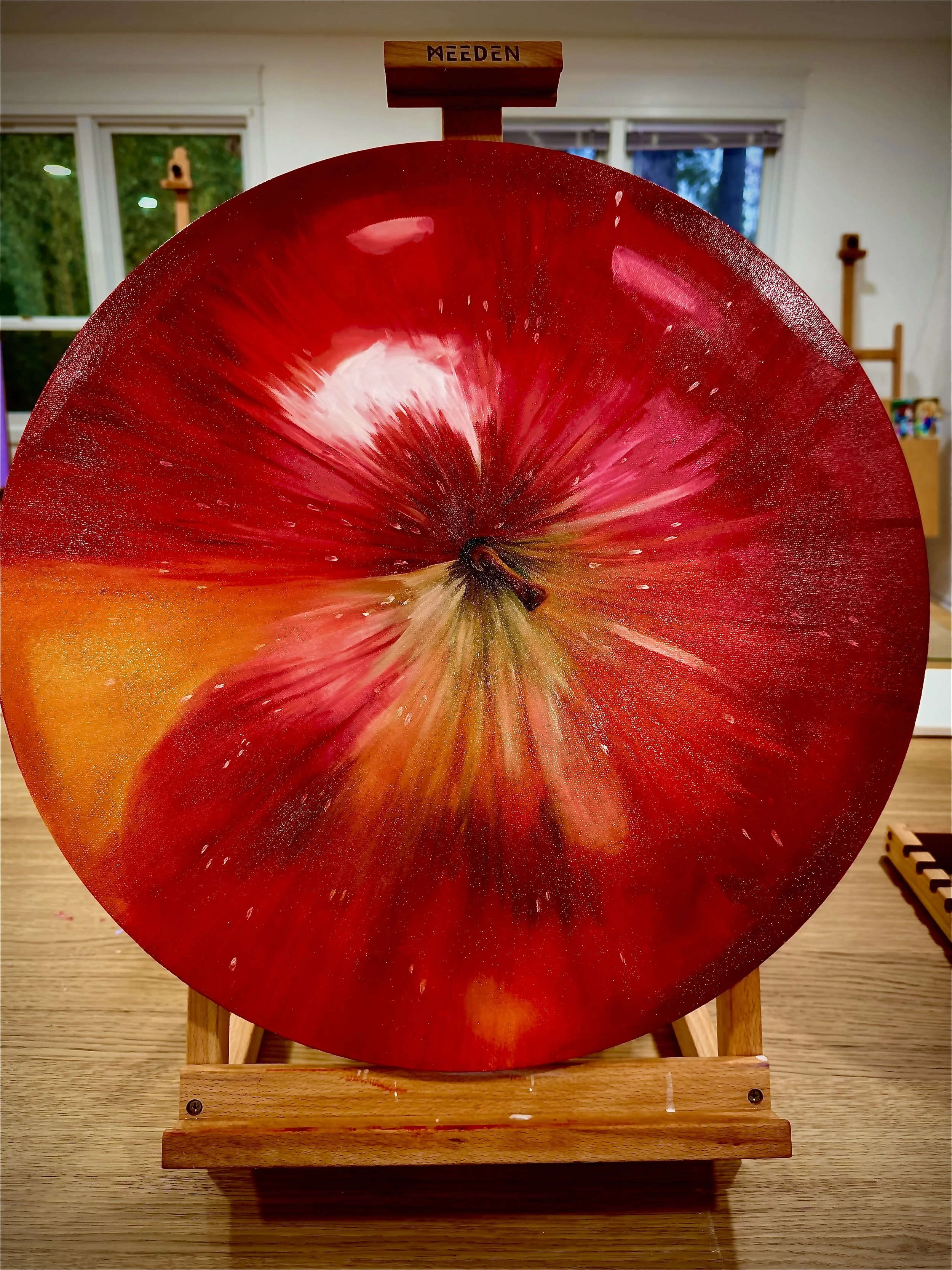 Apple on the round canvas