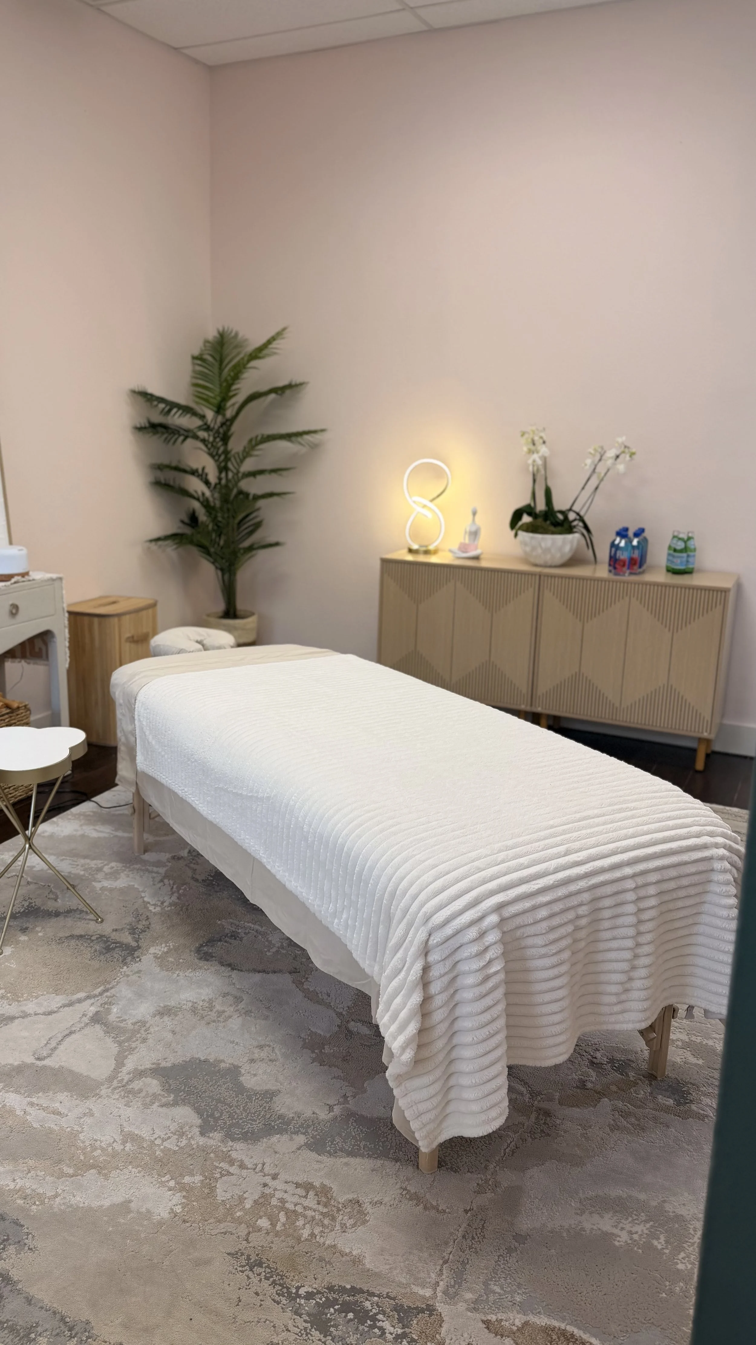 Certified post-operative lymphatic drainage treatment room prepared for plastic surgery recovery and healing support.