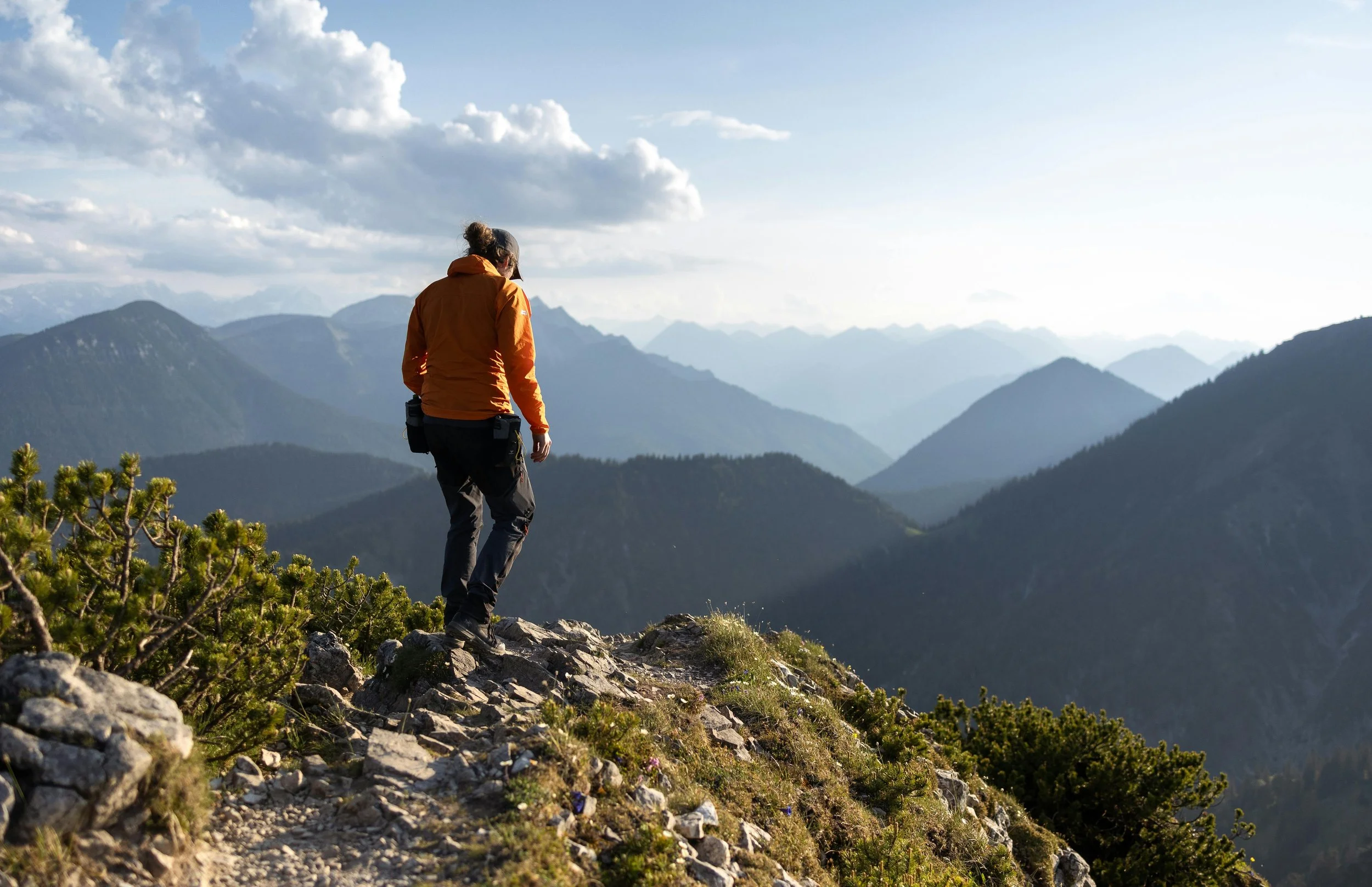 Woman walks in mountains