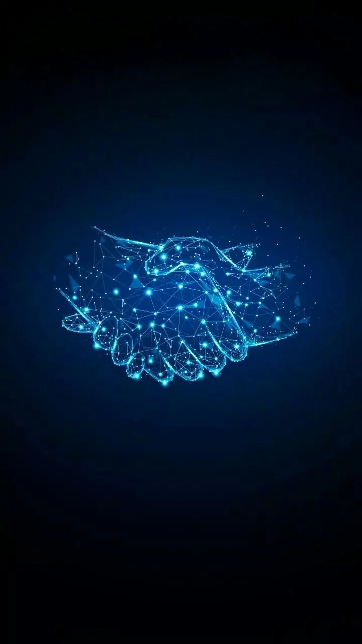 Digital illustration of two hands shaking, made up of glowing blue lines and dots, representing technology and connection.