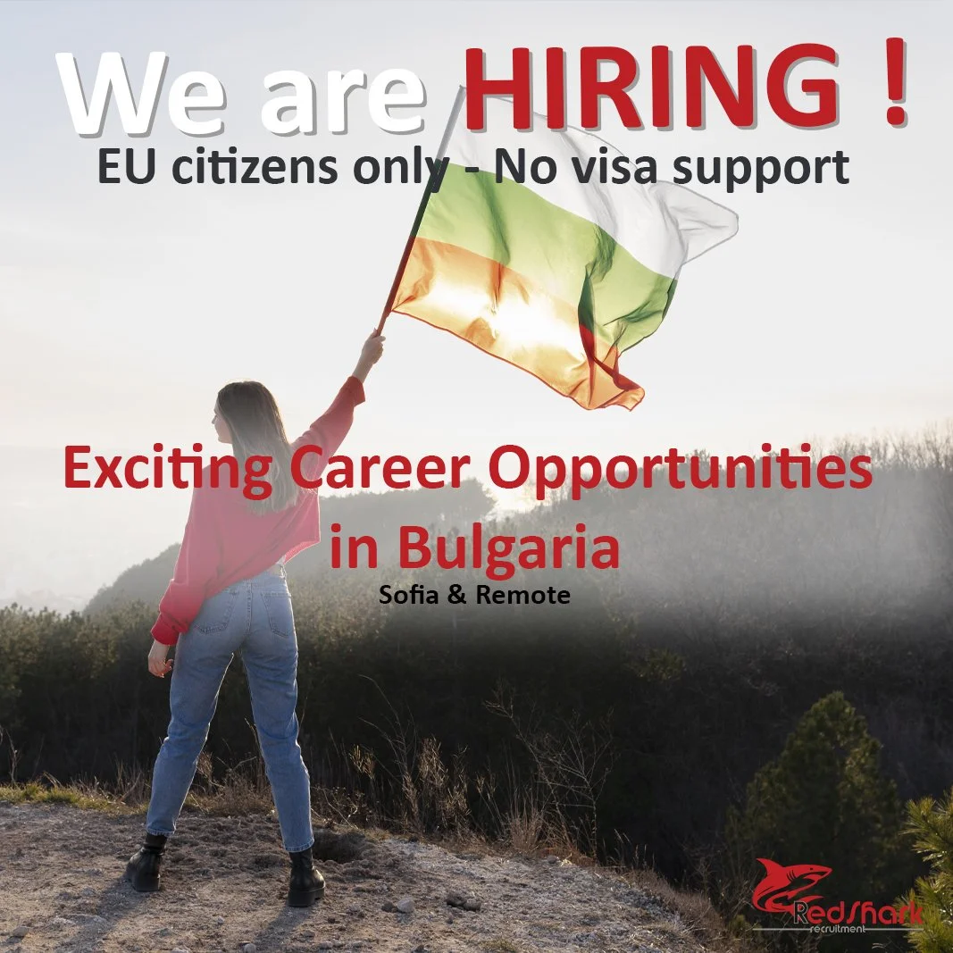 A person holding a Bulgarian flag on a cliff with a caption advertising job opportunities in Bulgaria, stating 'We are hiring' for EU citizens only, no visa support, by Red Shark.