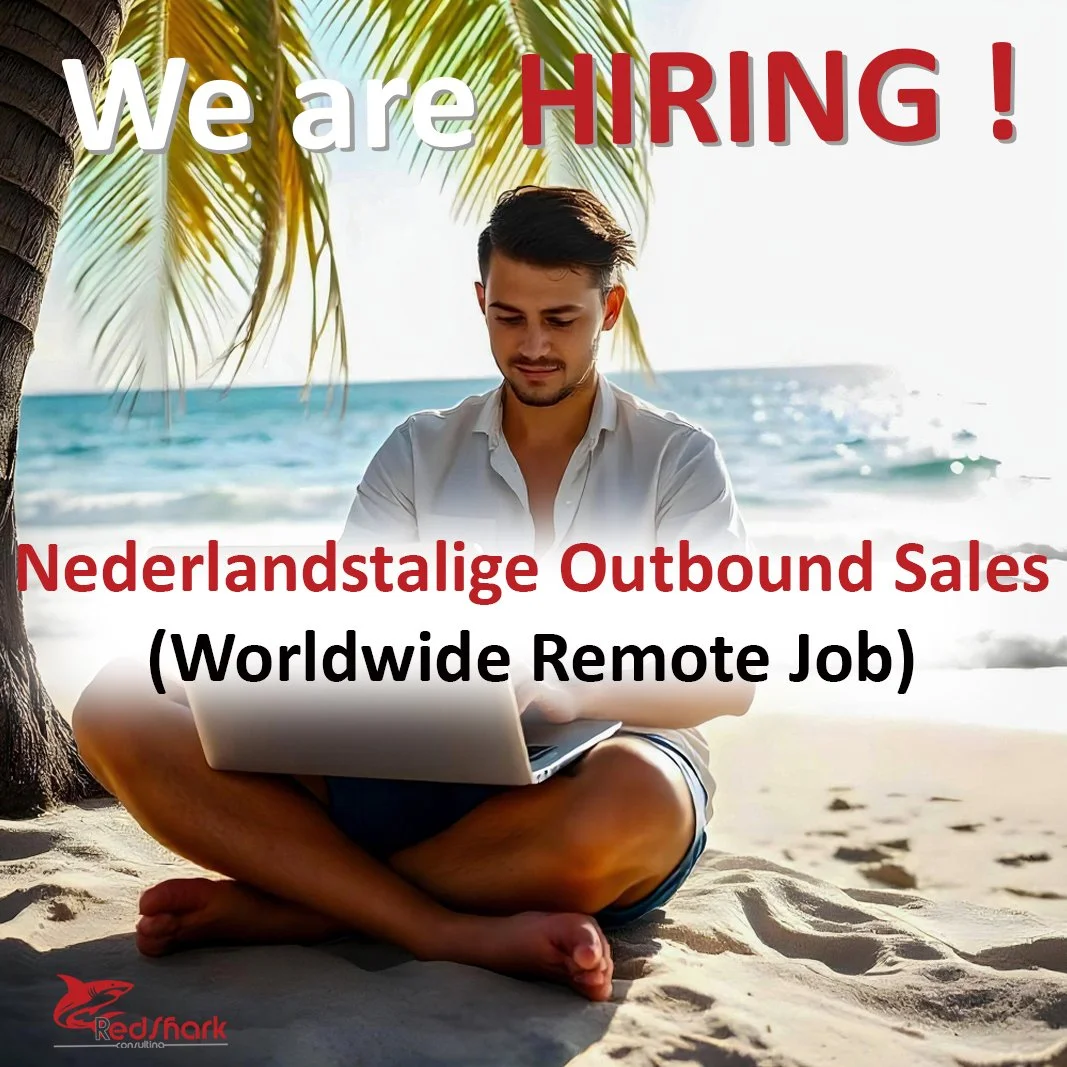A young man sitting cross-legged on the beach under a palm tree, working on a laptop, with the ocean in the background. Text overlay announces a hiring for wereldwijdstale outbound sales, a remote job opportunity.