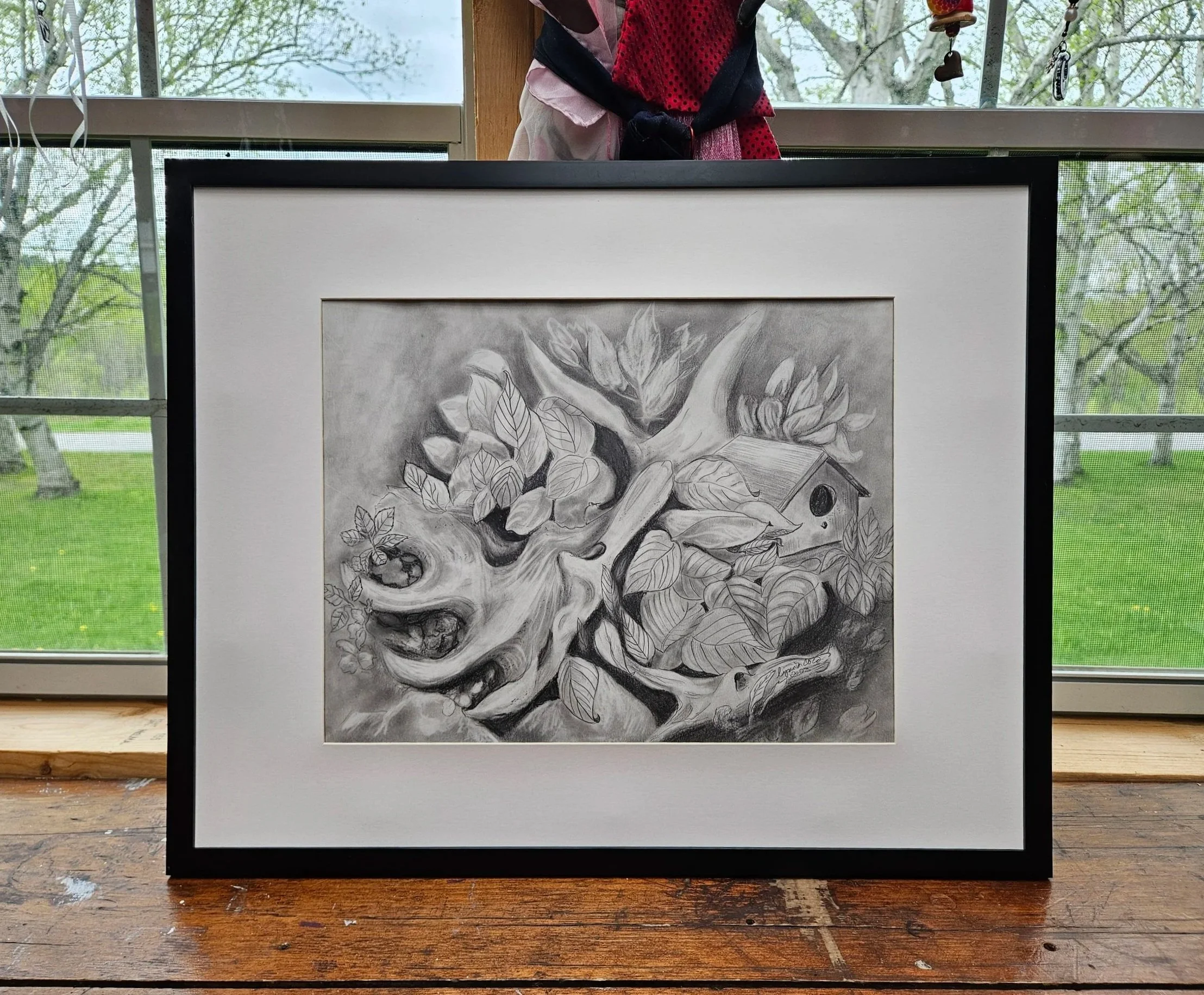 Original pencil drawing, moose antler and birdhouse shown in black frame by Lynn M Cote, Birch Haven Studio