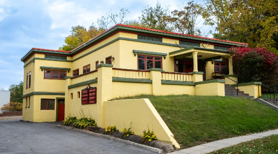 yellow house with big front porch