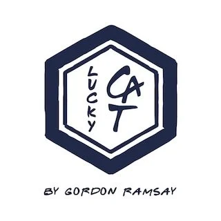 Logo featuring a dark blue hexagon with a white inner border and a smaller white hexagon inside. Inside the smaller hexagon, the words 'Lucky Cat' are written vertically on the left, and the initials 'C' and 'T' are in the center. Below the hexagon, the text 'BY GORDON RAMSAY' is written in handwritten style.