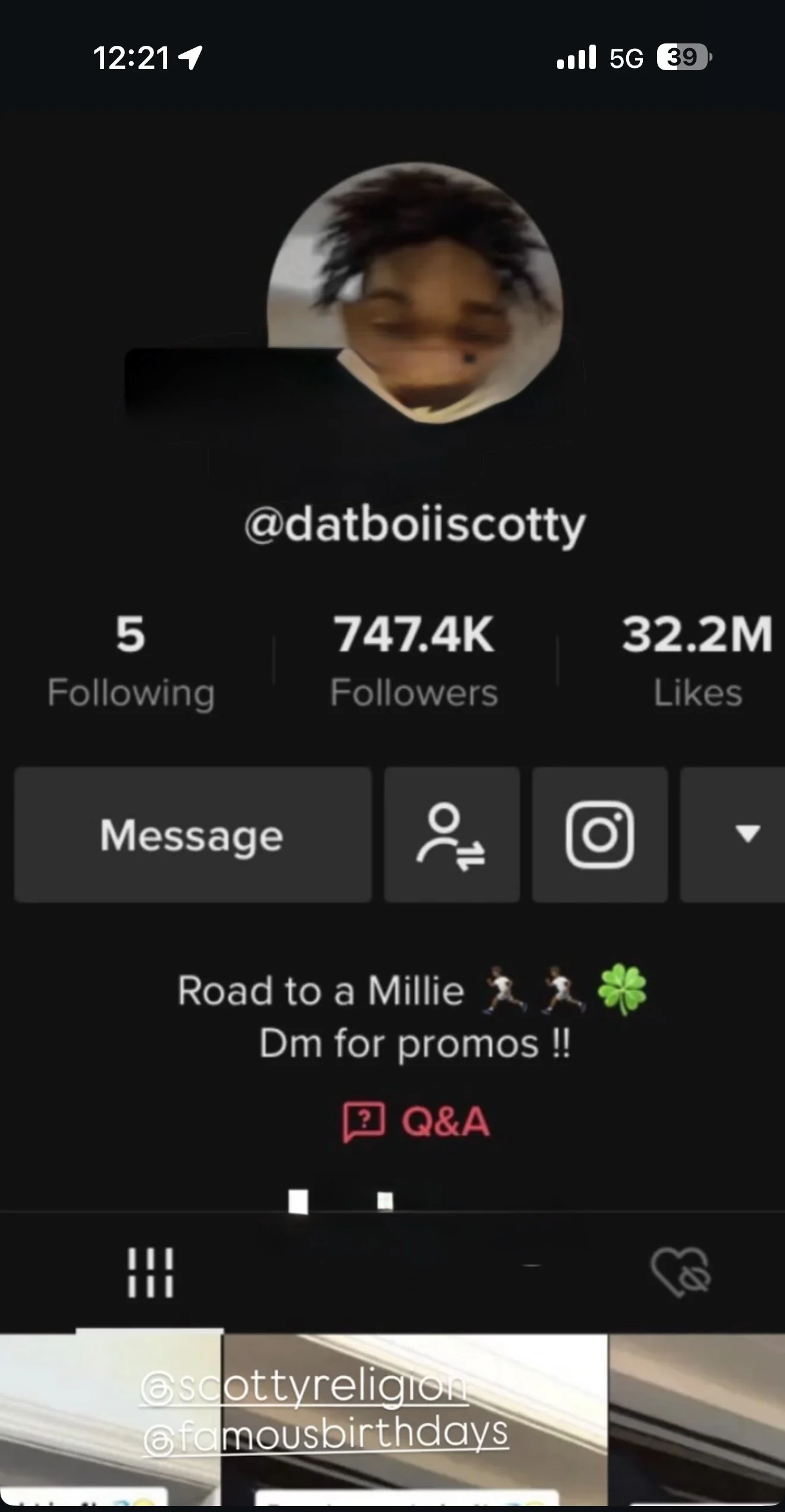 TikTok profile page of @datboiiiscotty with a blurry profile picture, showing 5 following, 747.4K followers, and 32.2M likes, featuring a message about road to a millie and promoting promos, with a Q&A section and icons for message, followers, and Instagram.