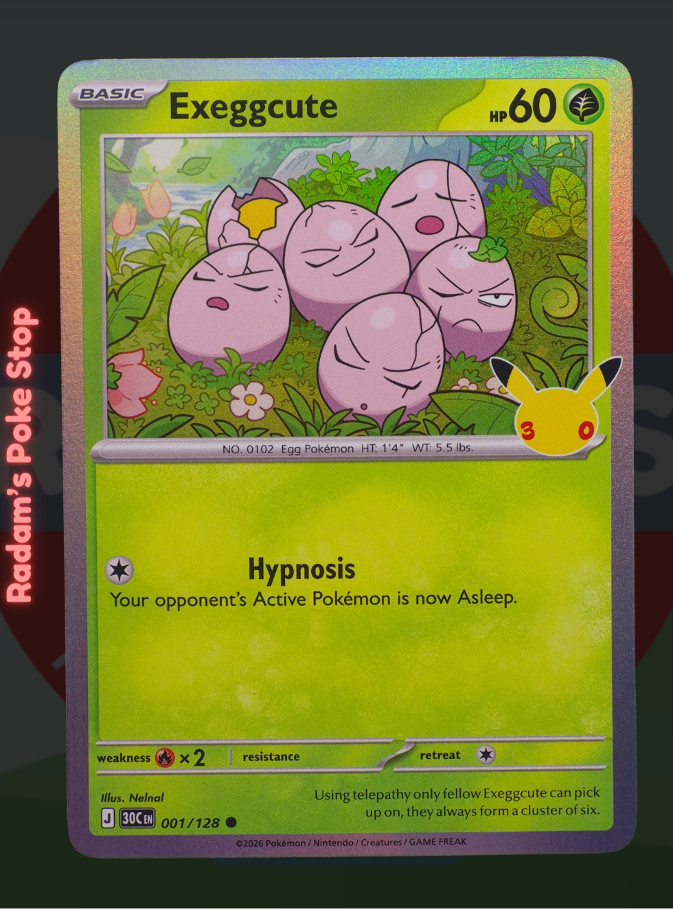 Exeggcute 001/128, 30th Celebrations, Holo Common presented by Pokémon TCG. 