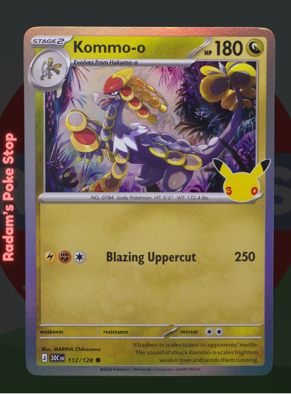Kommo-o 112/128, 30th Celebrations, Holo Common presented by Pokémon TCG. 