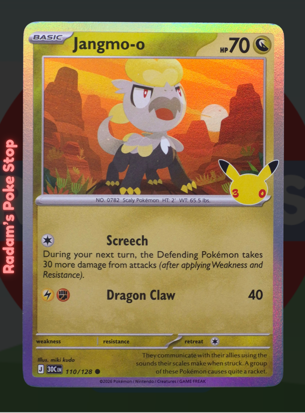 Jangmo-o 110/128, 30th Celebrations, Holo Common presented by Pokémon TCG. 