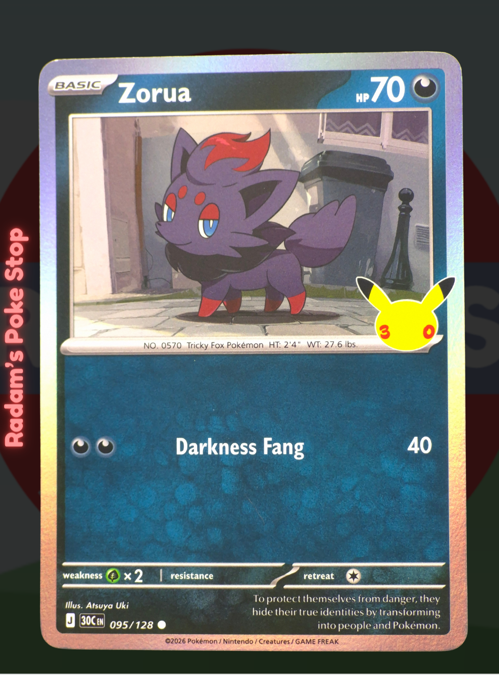 Zorua 095/128, 30th Celebrations, Holo Common presented by Pokémon TCG. 