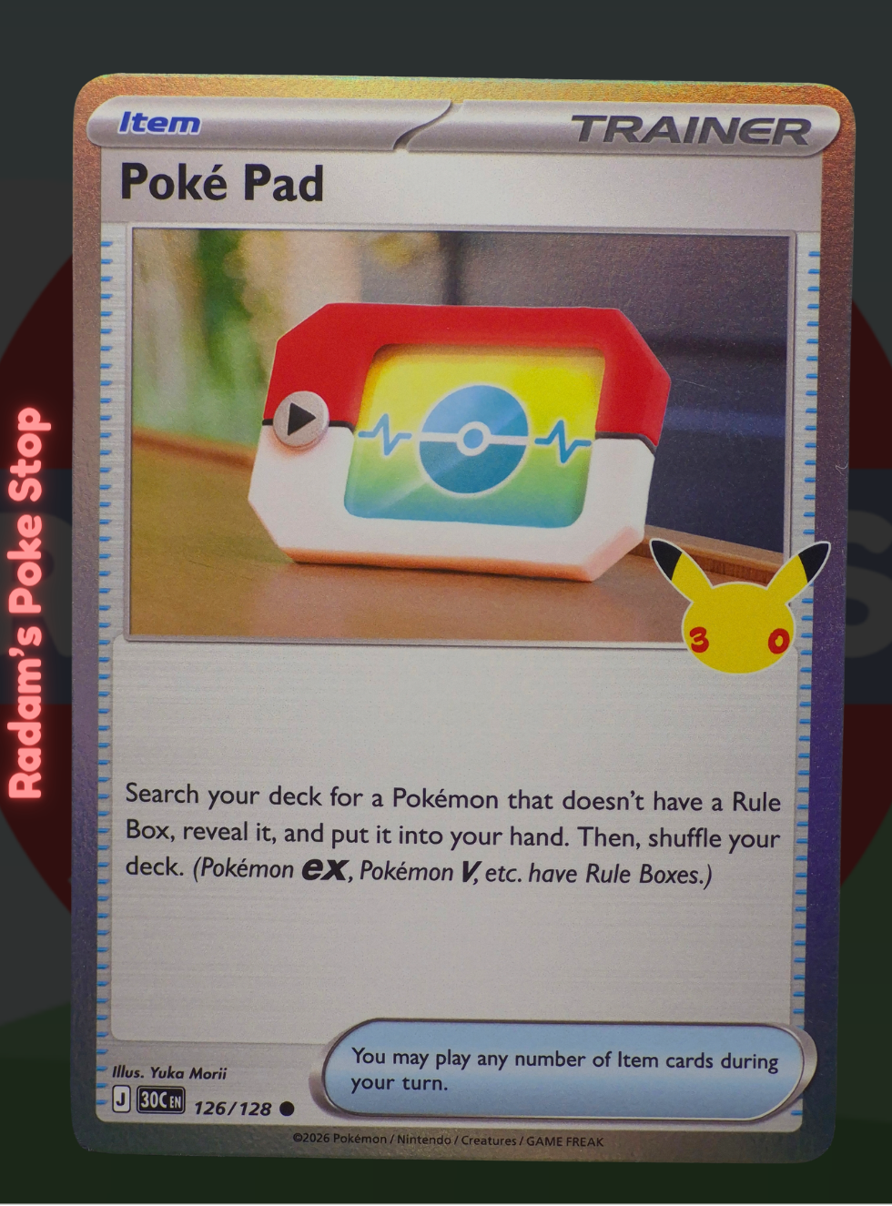 Poke Pad 126/128, 30th Celebrations, Holo Common presented by Pokémon TCG. 