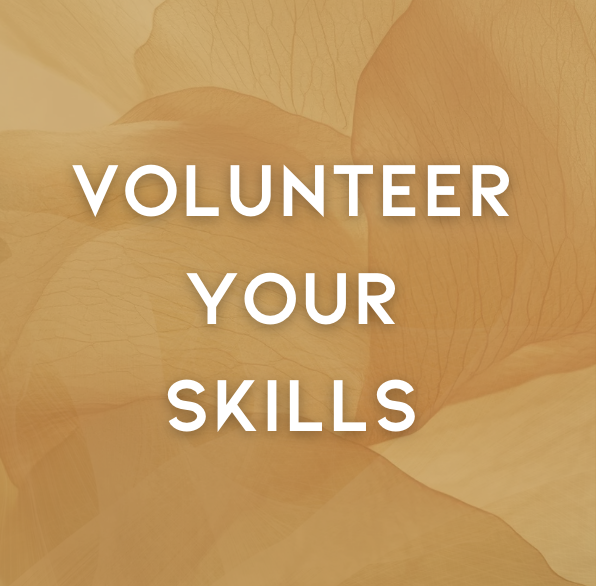 Text overlay on a yellow and orange floral background that reads, "Volunteer Your Skills."