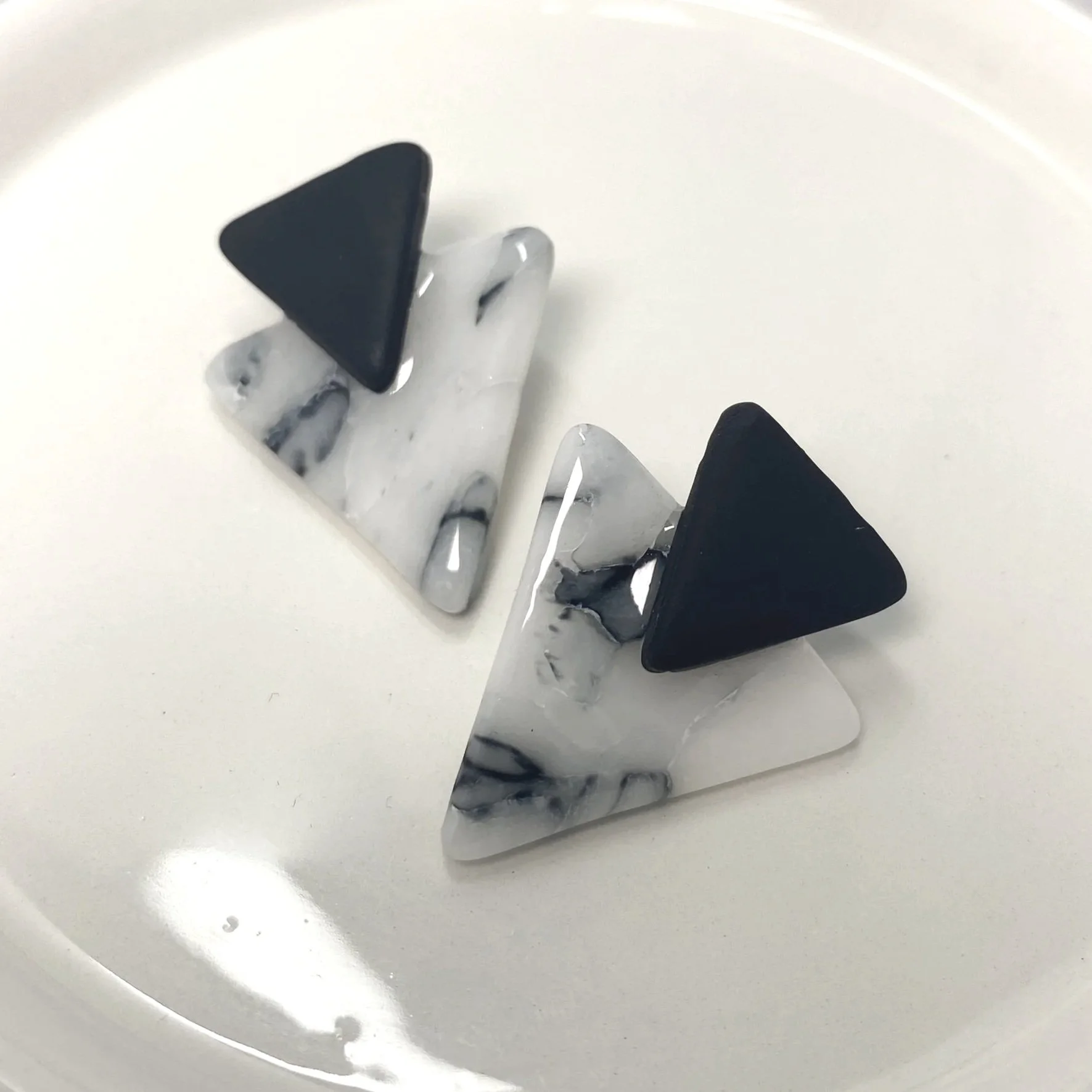 Triangle studs