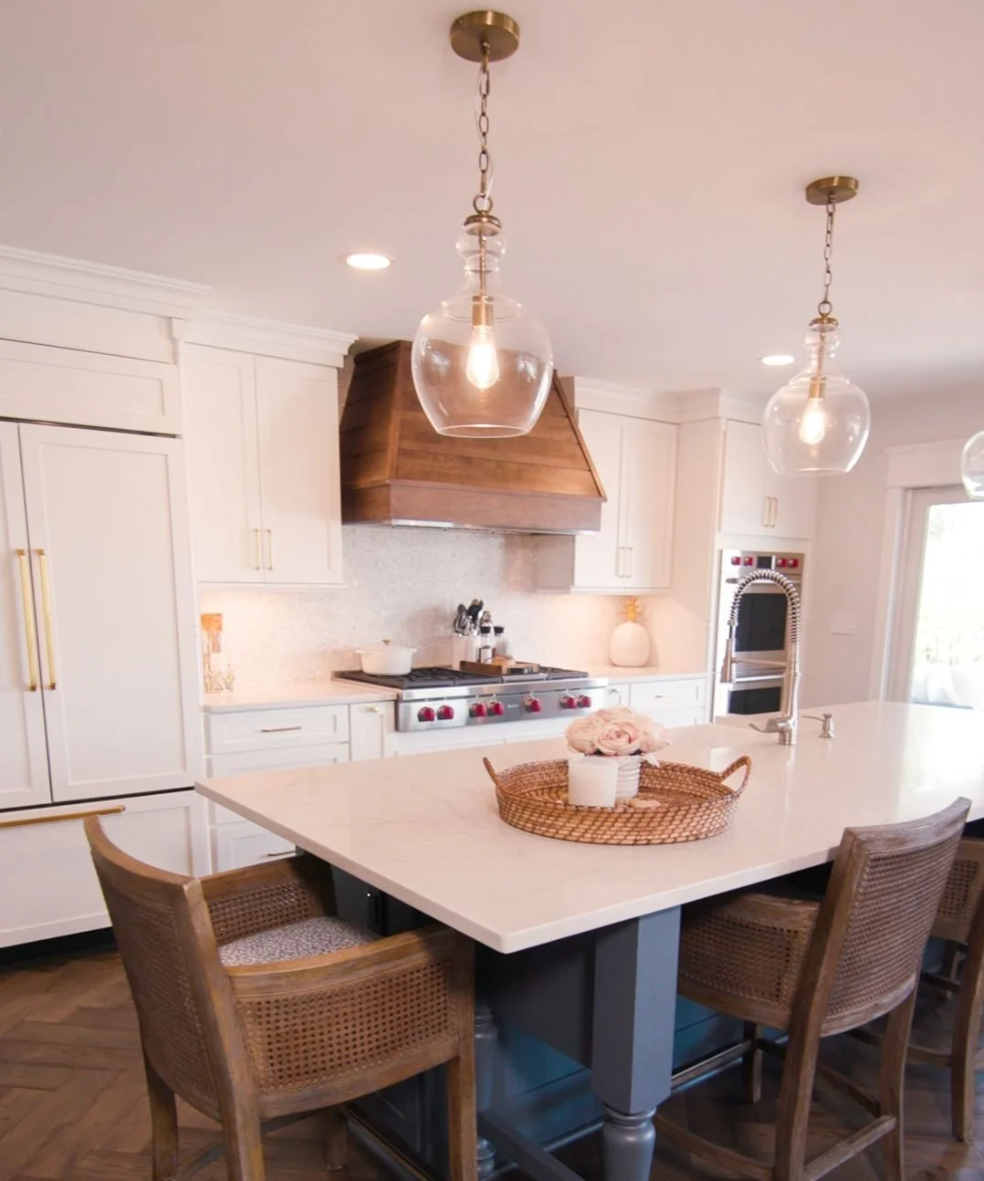 Nardini Custom Kitchen with white Plain and Fancy cabinetry, natural wood accents, and quartz countertops