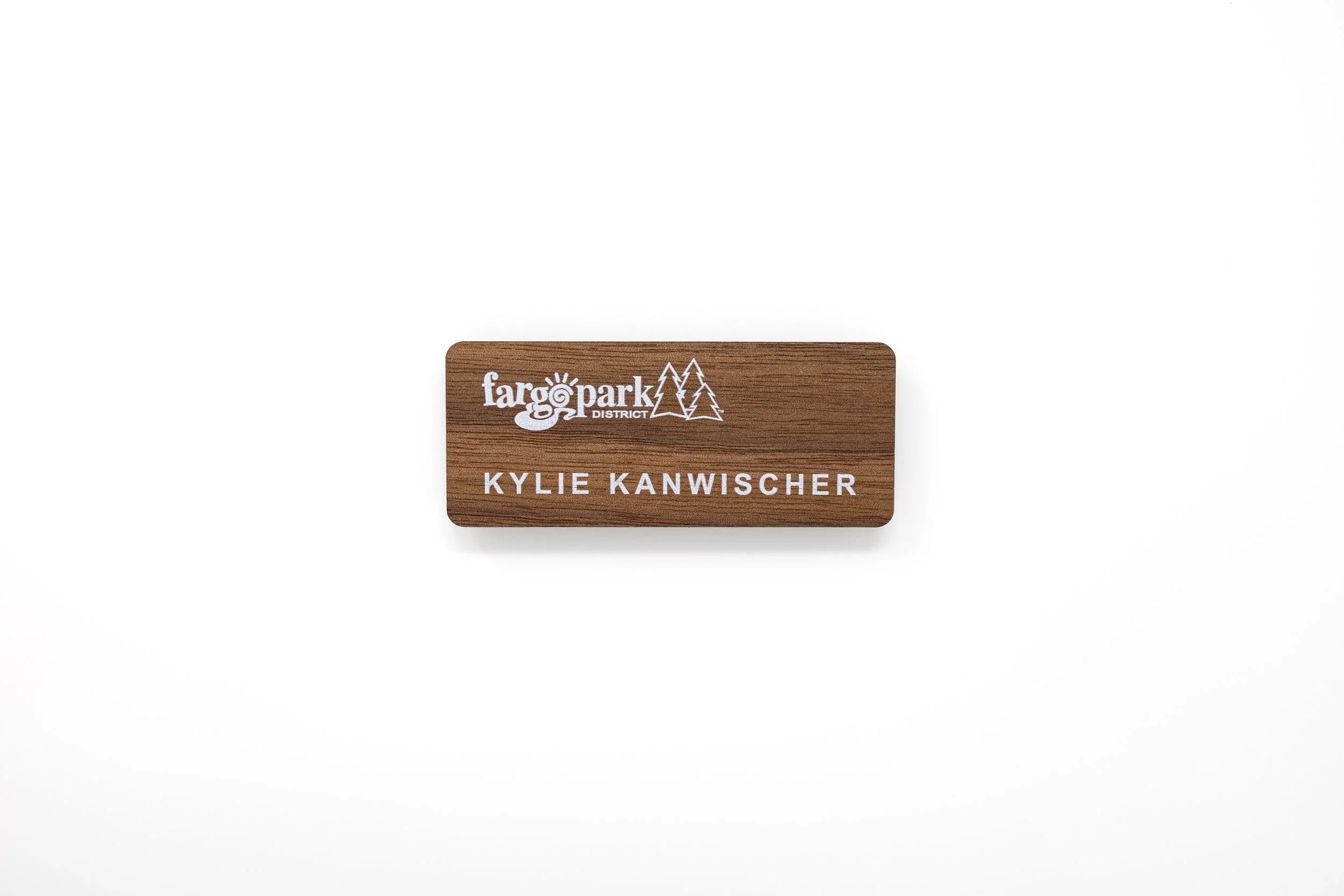 Fargo Park District - 1-8- Router-Cut Walnut Name Badge with Clear Coat and White UV-Print.jpg