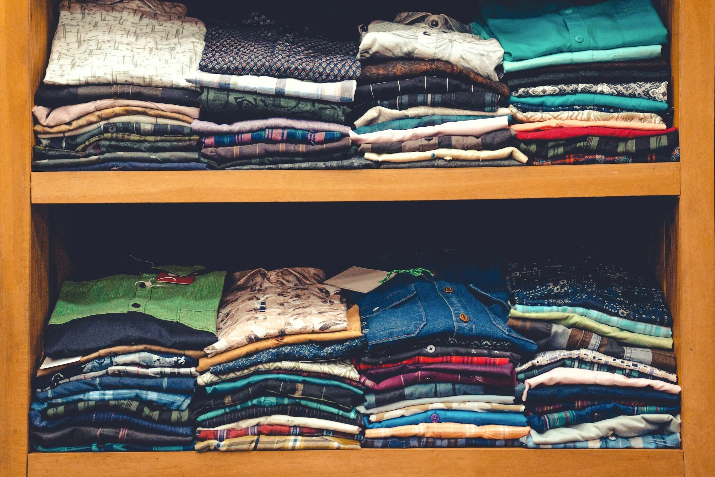 Folded clothing sorted for Grassroots Westmoreland volunteer support.