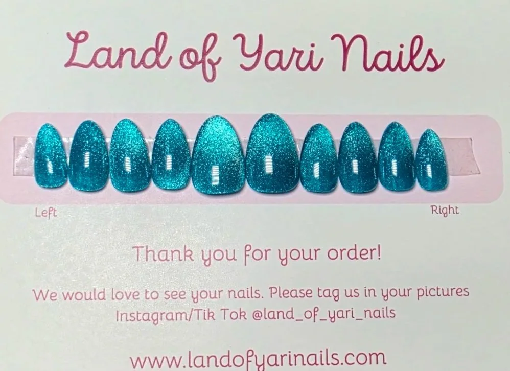 turquoise-cat-eye-short-almond-nails