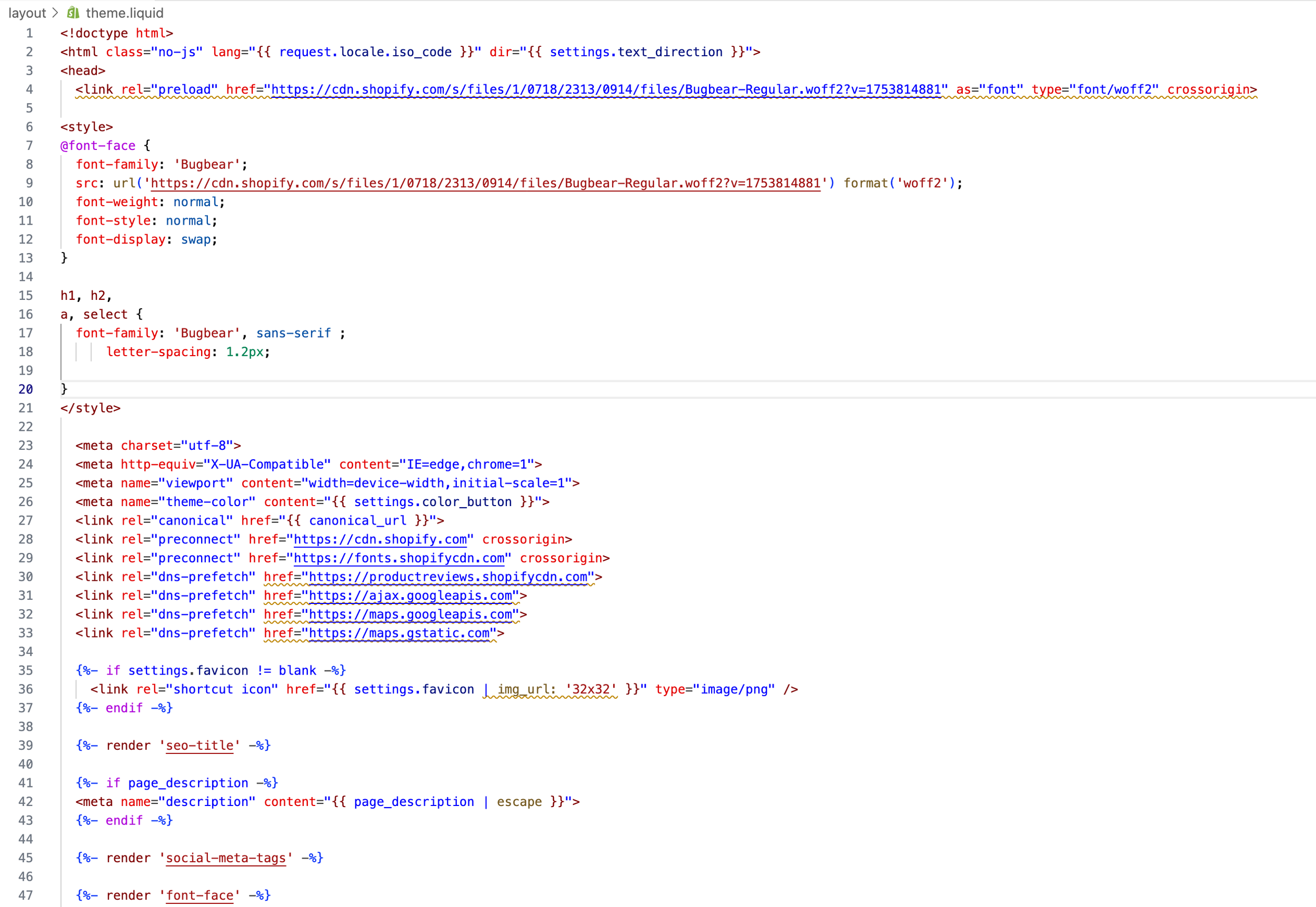 Screenshot of a Shopify theme editor code for theme.liquid, showing HTML, CSS, and meta tags for website setup.