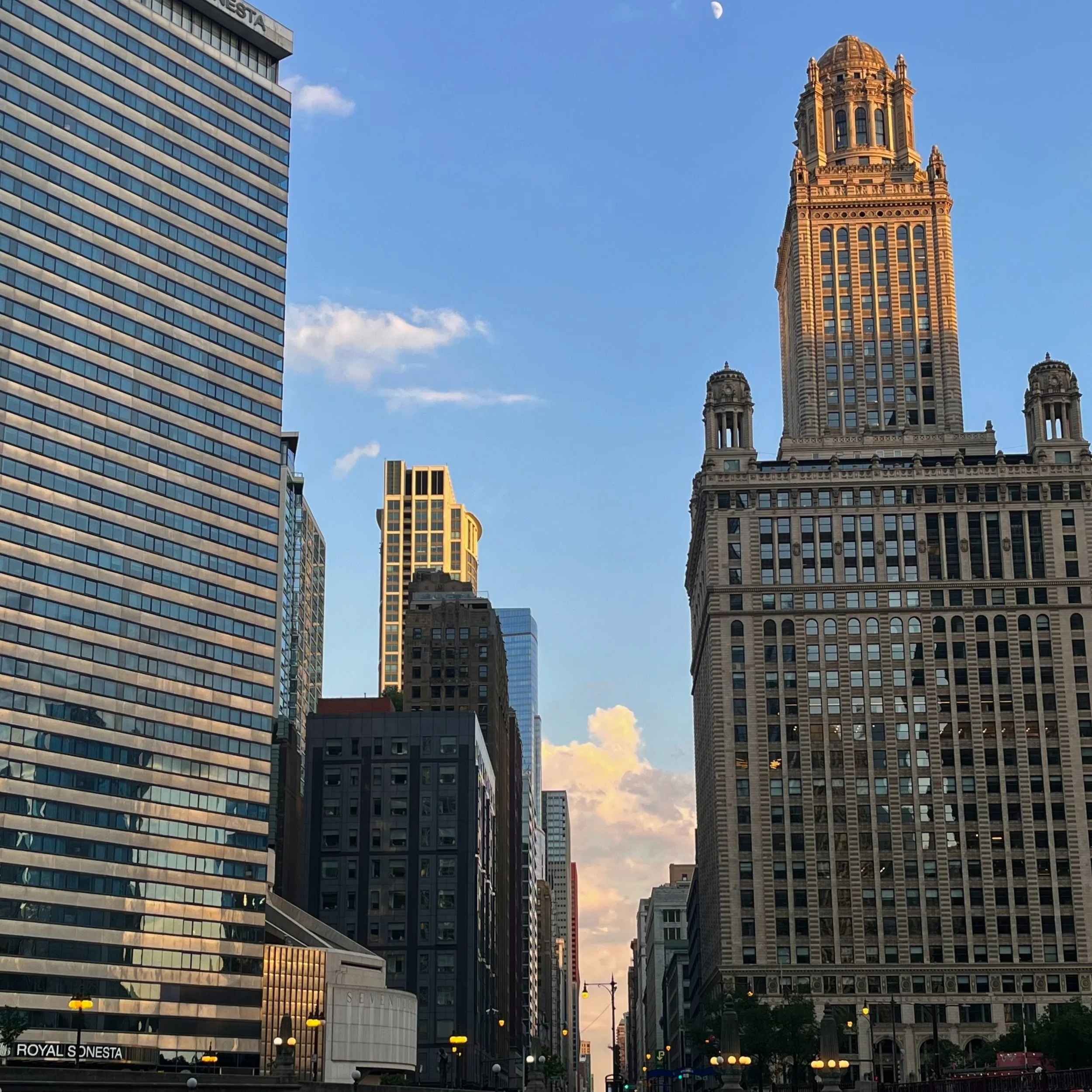 Cityscape of downtown skyscrapers with a clear blue sky at sunset. chicago