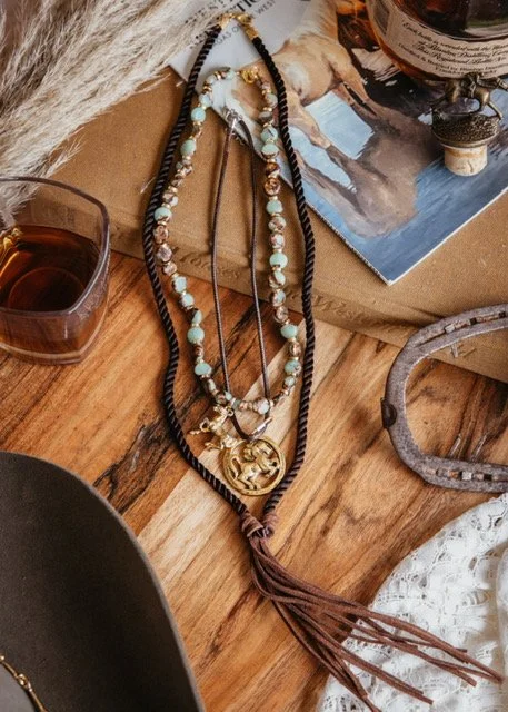 Decorative jewelry necklace with beads and a large pendant