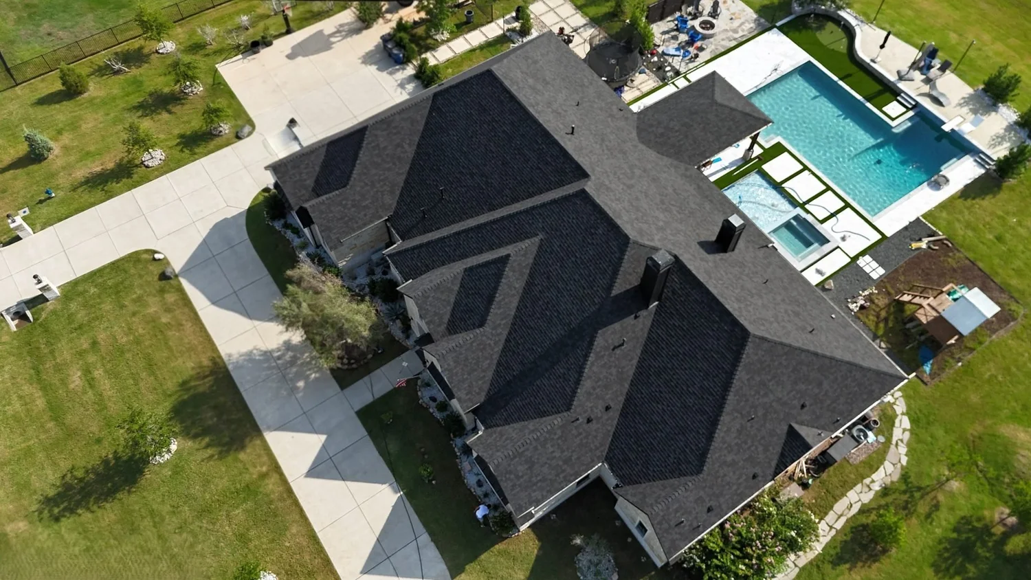 Aerial view of residential architectural shingle roofing by Iron Eagle Roofing